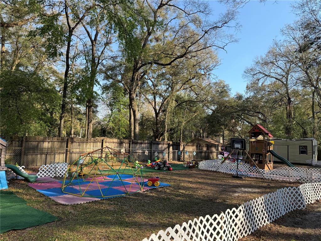 7713 Southwest 8th Avenue Gainesville, FL 32607 - Photo 25 of 32 a view of park with large trees