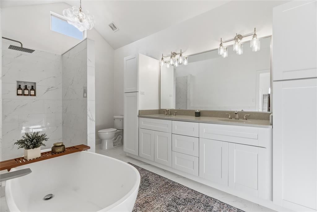 846 Old Tioga Road Gunter, TX 75058 - Photo 13 of 38 a bathroom with a sink and a mirror