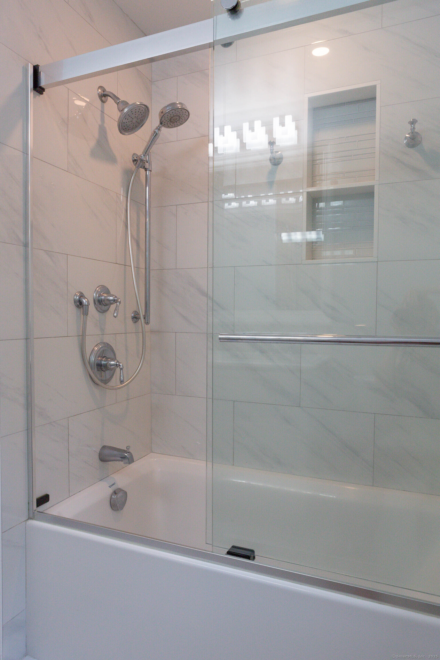 161 Foggwood Road Fairfield, CT 06824 - Photo 23 of 34 a bathroom with a shower and a bath tub