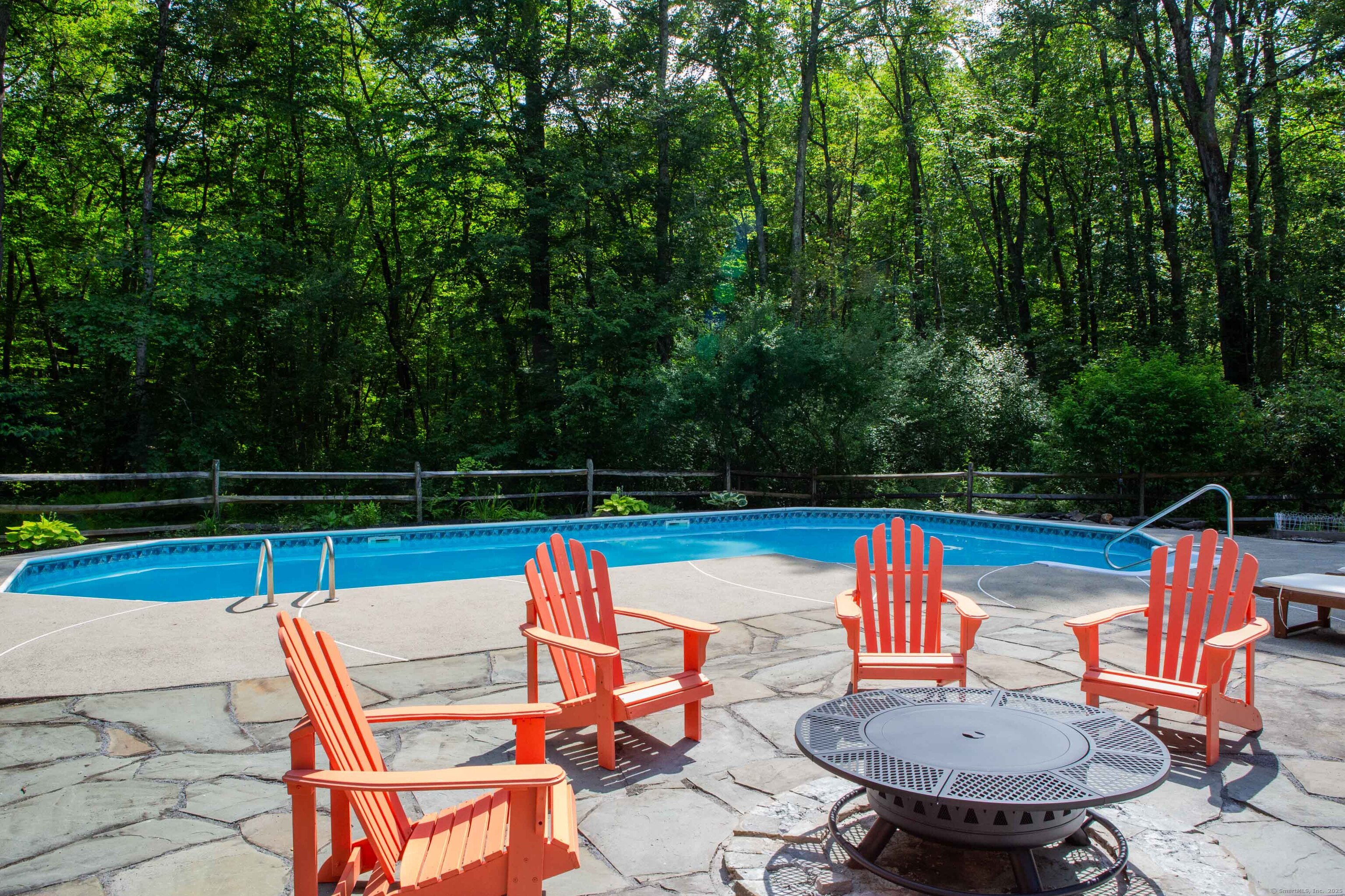 161 Foggwood Road Fairfield, CT 06824 - Photo 32 of 34 a view of deck with chairs and wooden floor