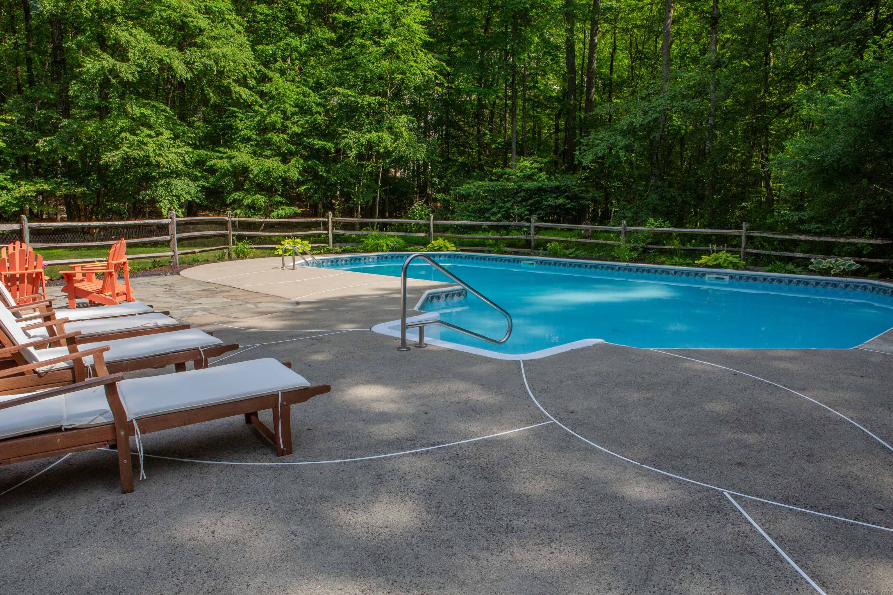 161 Foggwood Road Fairfield, CT 06824 - Photo 33 of 34 a view of a tennis court with a small pool