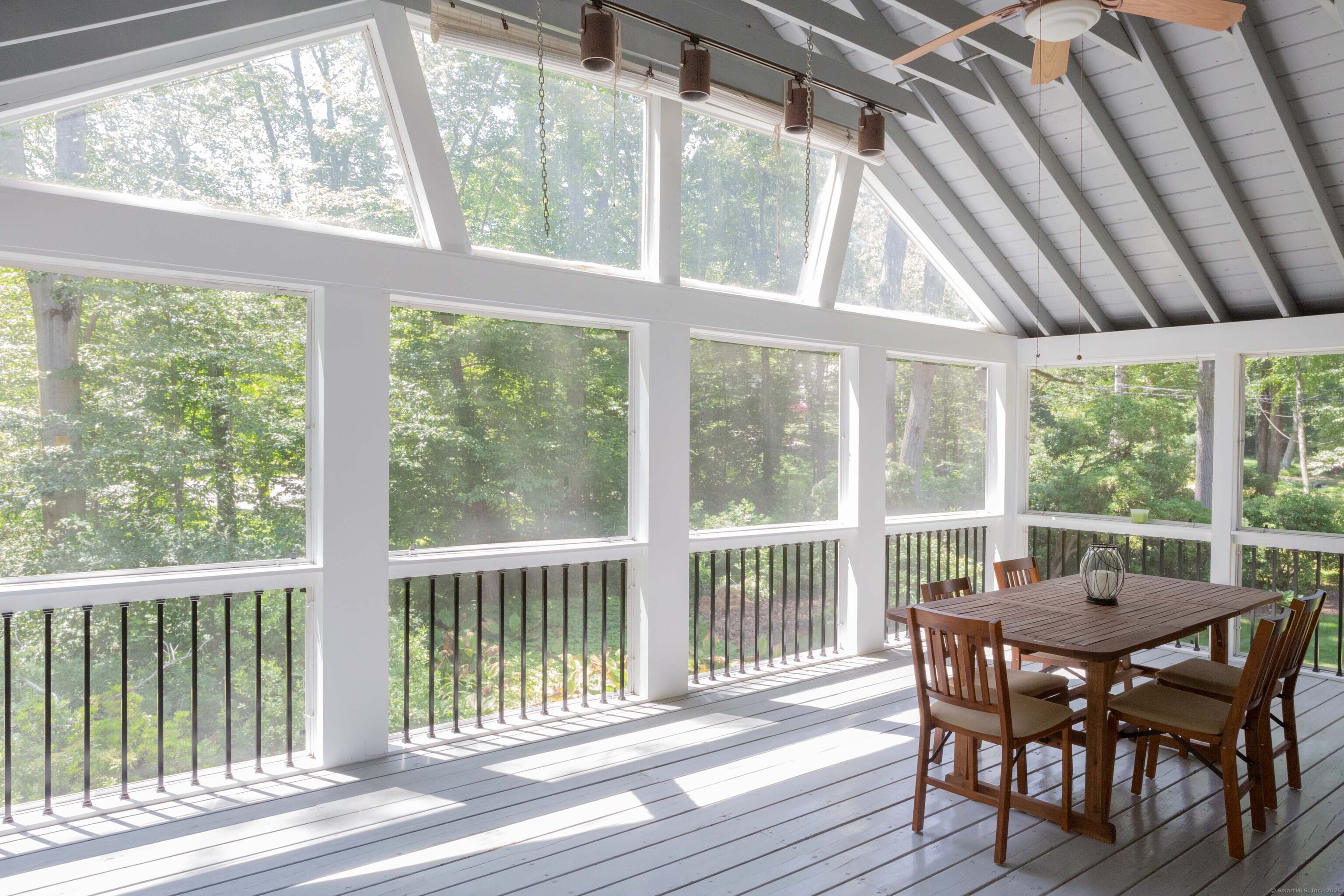 161 Foggwood Road Fairfield, CT 06824 - Photo 7 of 34 a view of a dining room with furniture window and wooden floor