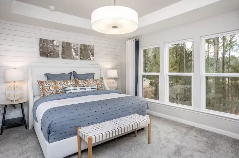 7159 Mapleside Lane Fairview, TN 37062 - Photo 23 of 38 a bedroom with a bed and a large window