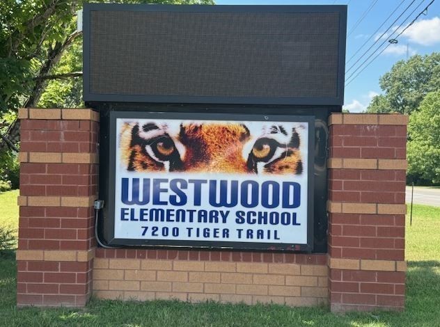 7159 Mapleside Lane Fairview, TN 37062 - Photo 27 of 38 a sign on the side of a building