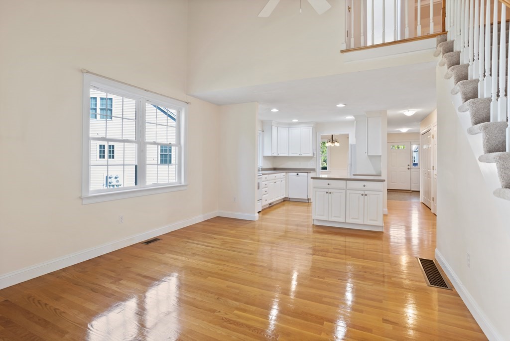 114 Summer Road, Unit 114 Boxborough, MA 01719 - Photo 20 of 42 a view of kitchen with kitchen island microwave and cabinets