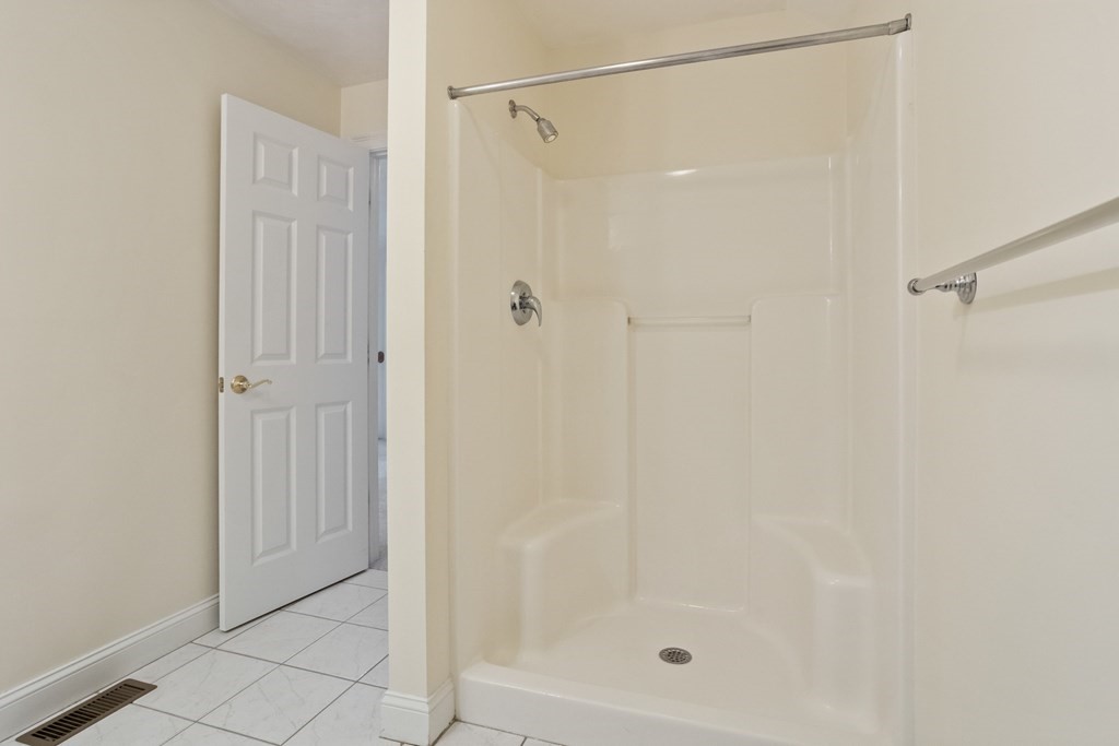 114 Summer Road, Unit 114 Boxborough, MA 01719 - Photo 39 of 42 a bathroom with a shower