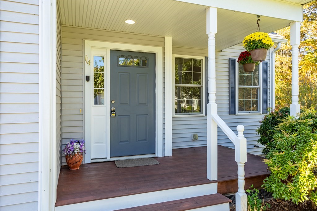 114 Summer Road, Unit 114 Boxborough, MA 01719 - Photo 4 of 42 an entrance to house with porch