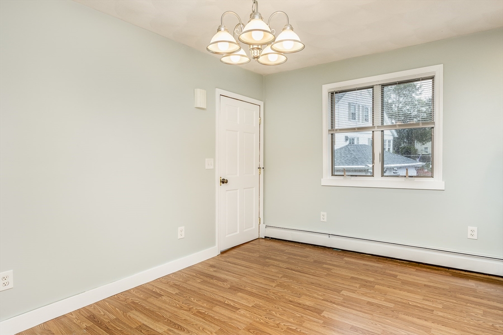 22 Clovelly Street Lynn, MA 01902 - Photo 9 of 28 a view of an empty room with a window
