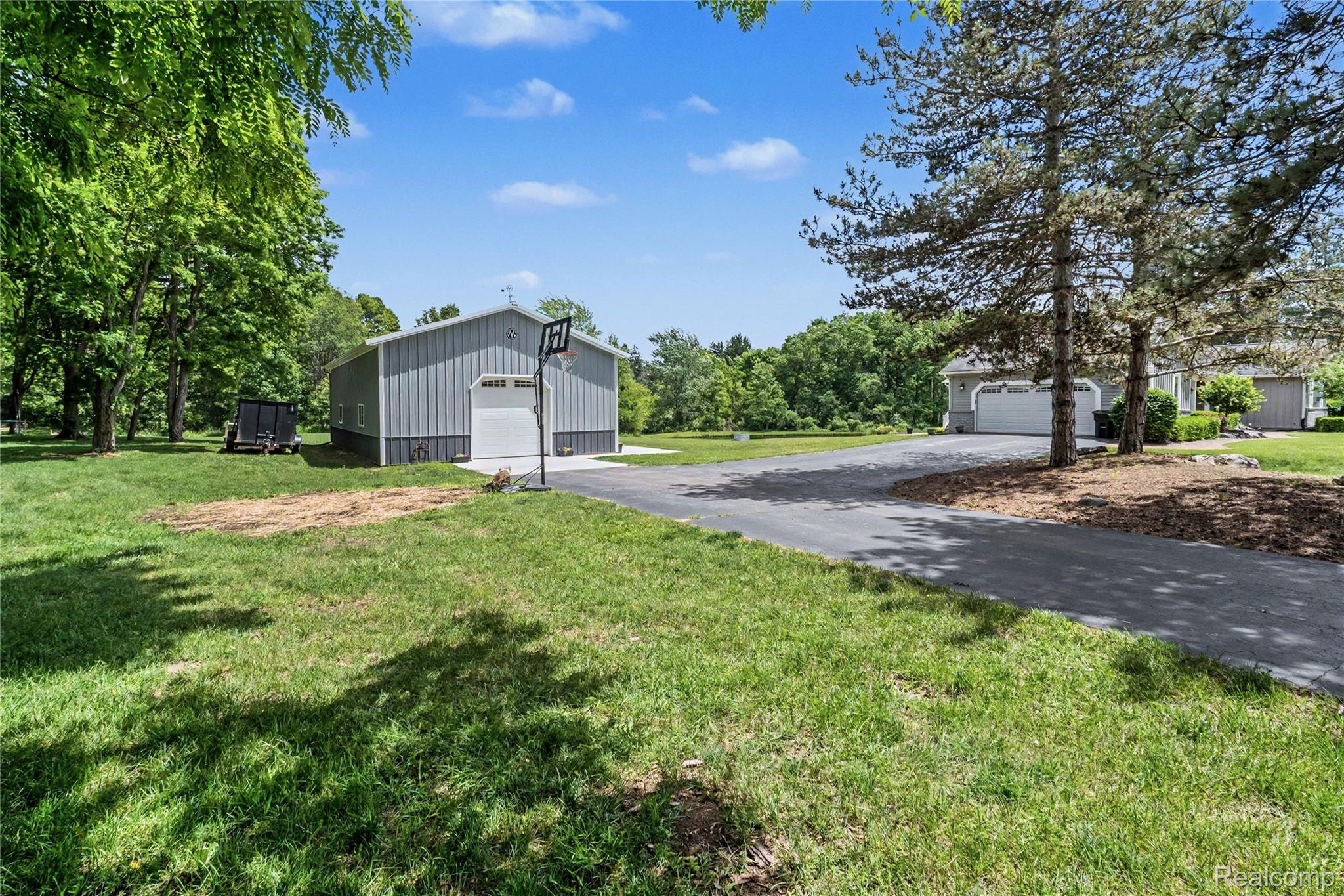 5465 South Lake George Road Metamora, MI 48455 - Photo 42 of 61 Paved driveway to residence
