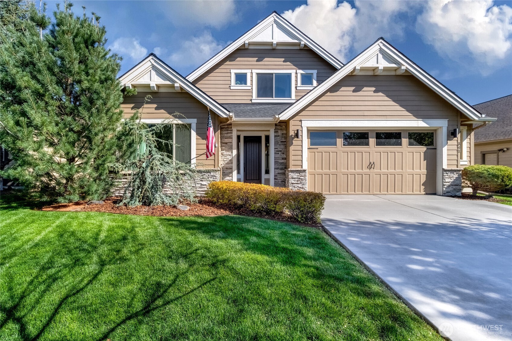 341 Reserve Way Walla Walla, WA 99362 - Photo 1 of 40 a front view of a house with a yard and porch