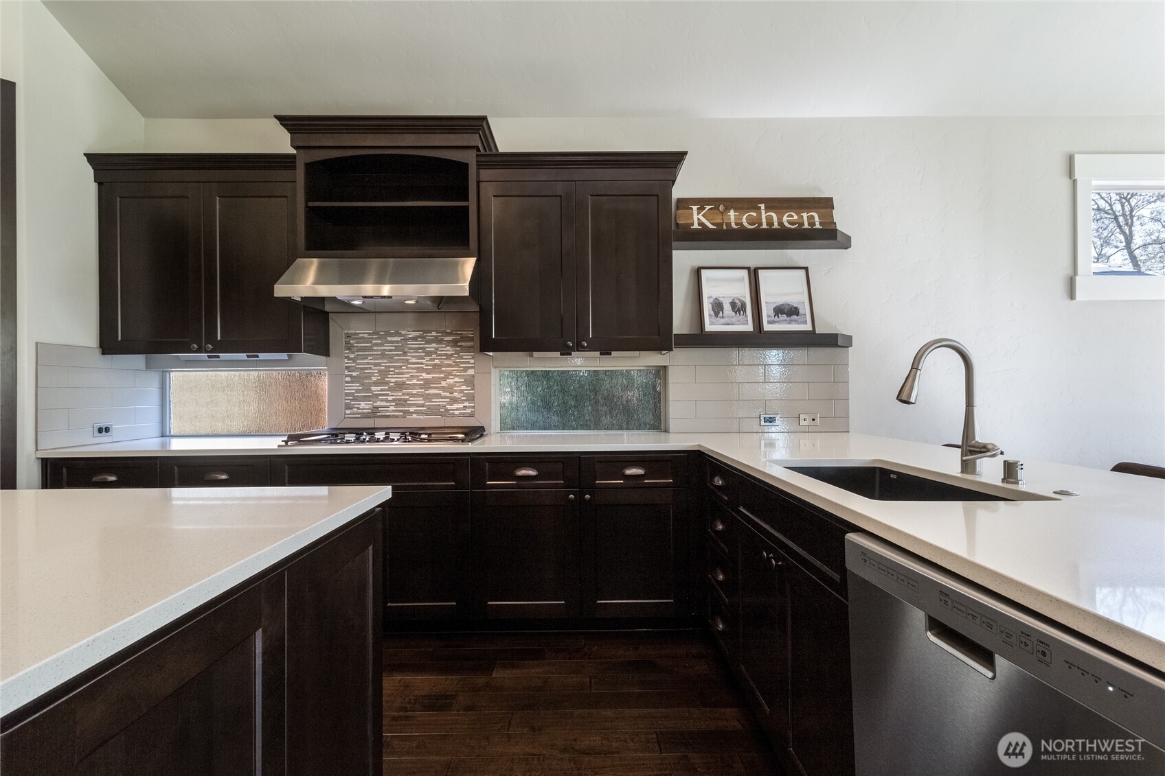 341 Reserve Way Walla Walla, WA 99362 - Photo 11 of 40 a kitchen with stainless steel appliances a sink dishwasher and cabinets