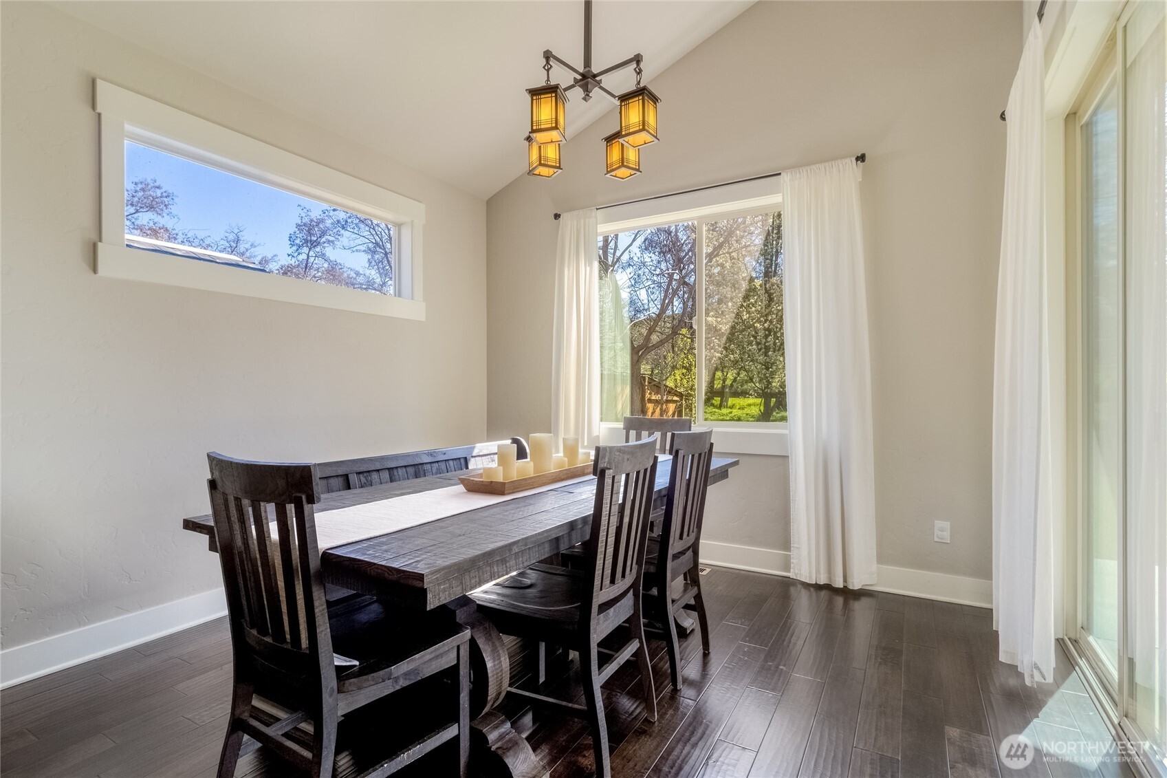 341 Reserve Way Walla Walla, WA 99362 - Photo 13 of 40 a view of a dining room with furniture window and wooden floor