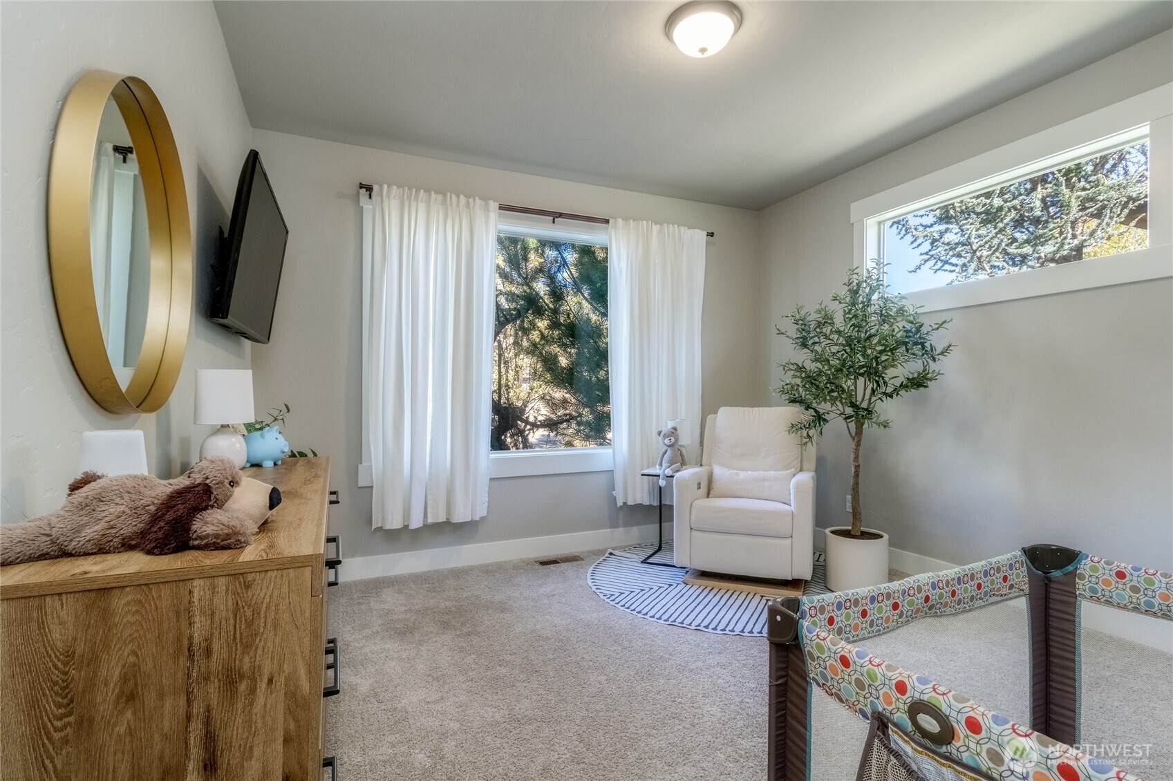 341 Reserve Way Walla Walla, WA 99362 - Photo 19 of 40 a living room with furniture and a potted plant