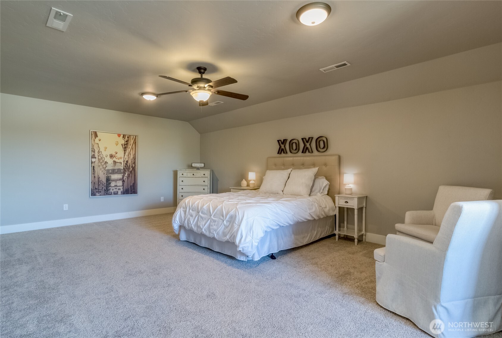 341 Reserve Way Walla Walla, WA 99362 - Photo 25 of 40 a bedroom with a bed and a chair