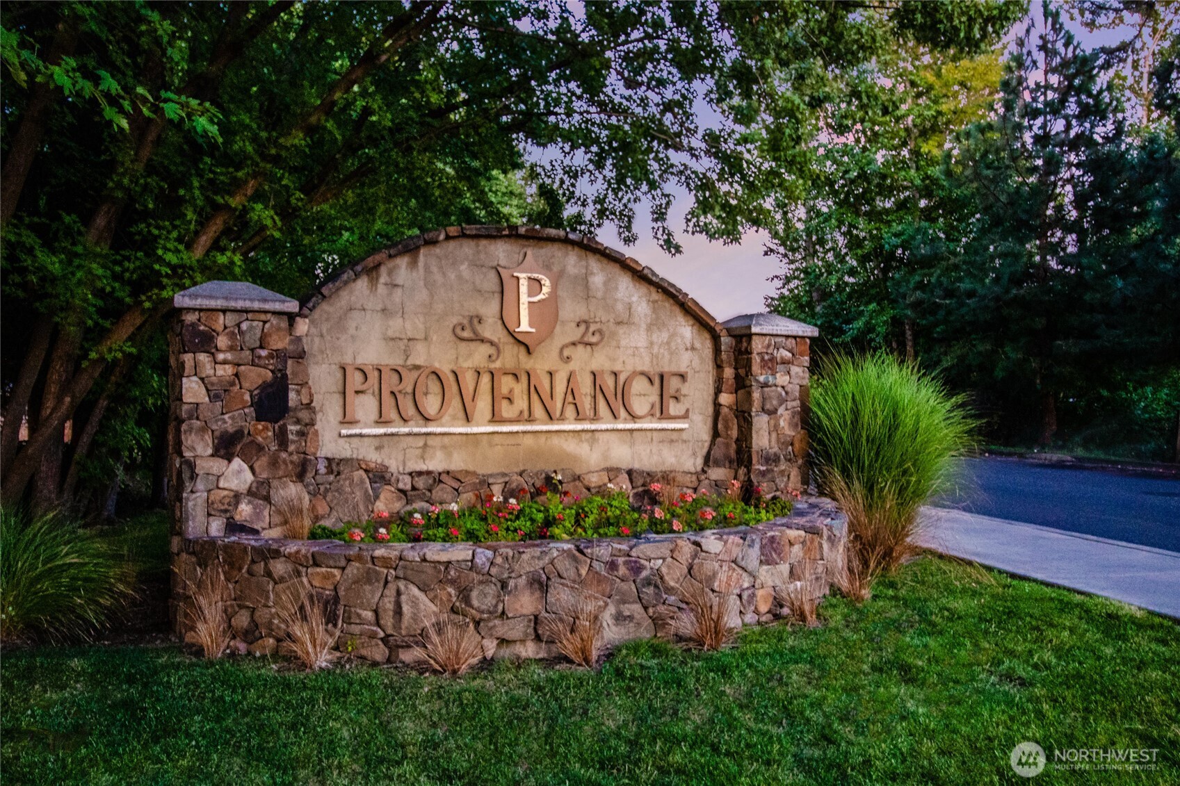 341 Reserve Way Walla Walla, WA 99362 - Photo 40 of 40 a sign that is sitting in front of flowers