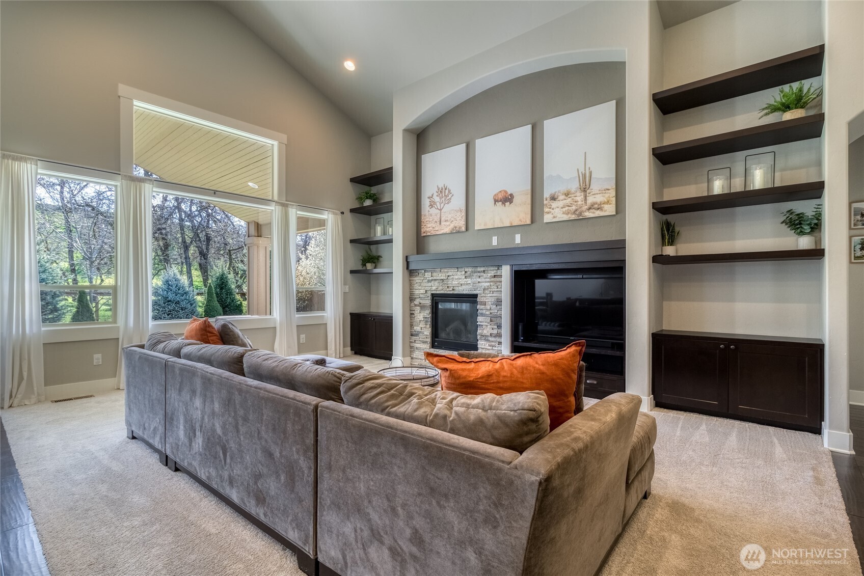 341 Reserve Way Walla Walla, WA 99362 - Photo 7 of 40 a living room with furniture and a fireplace