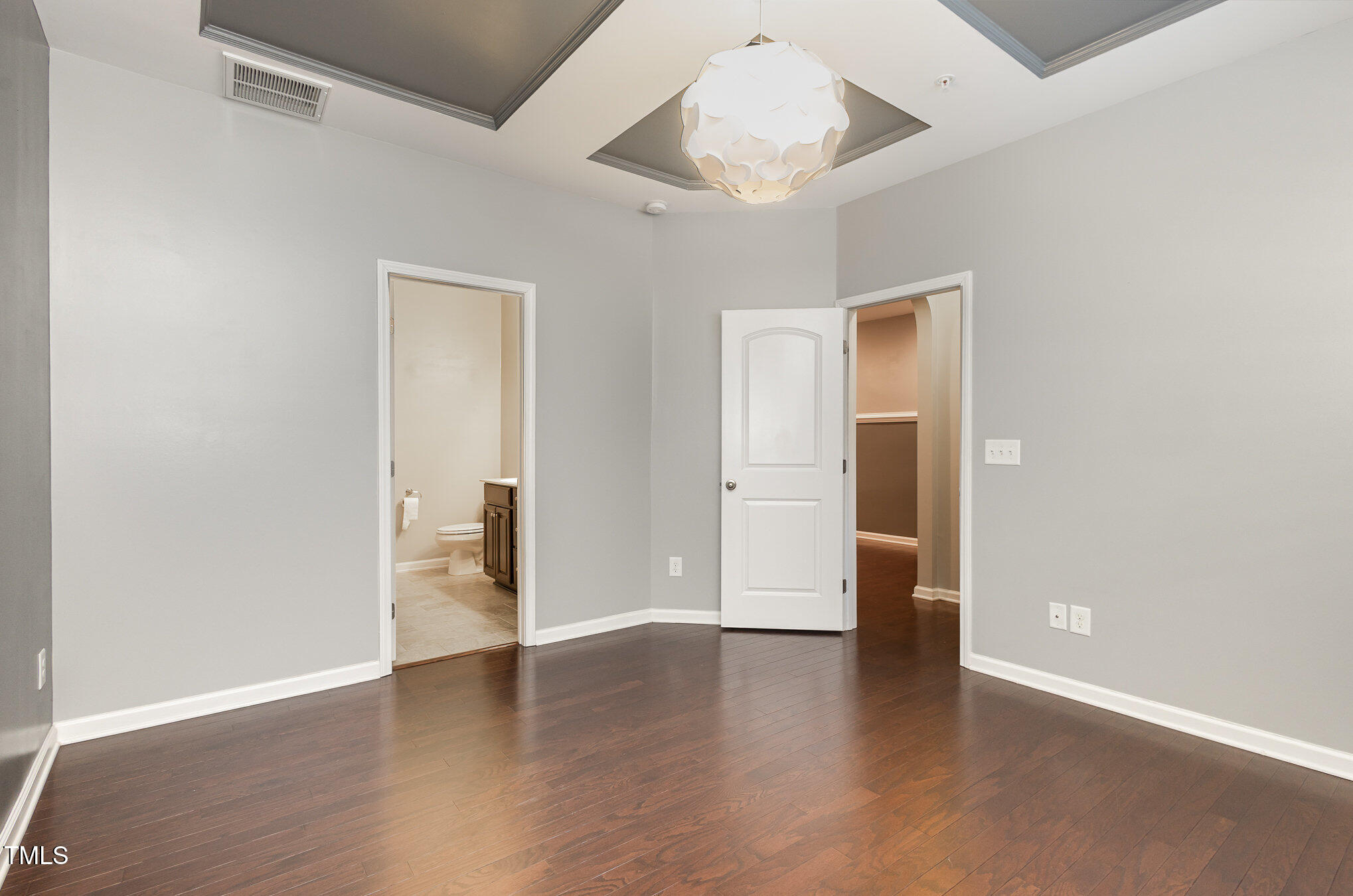 9345 Falkwood Road Raleigh, NC 27617 - Photo 3 of 32 1st Floor Primary Bedroom