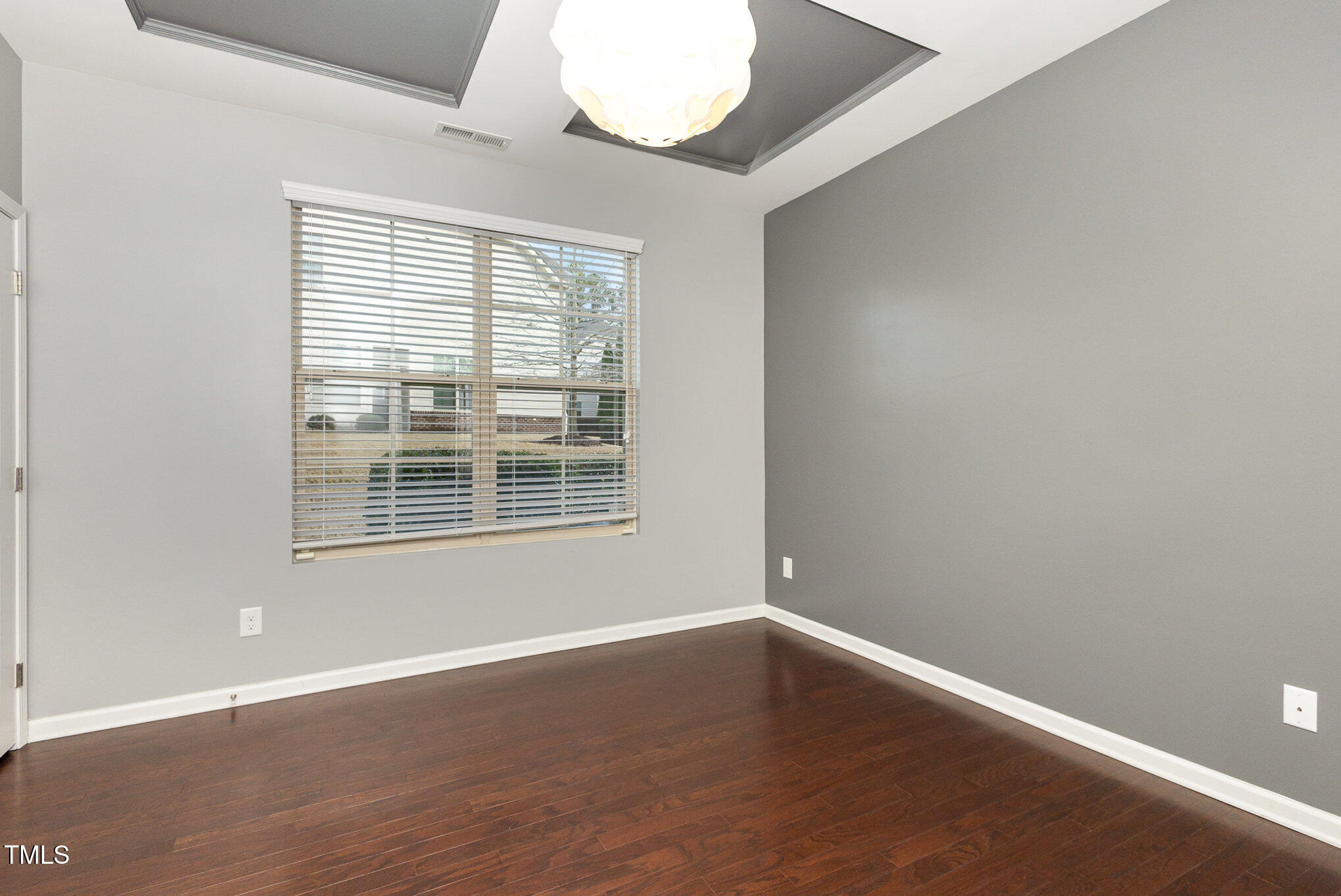 9345 Falkwood Road Raleigh, NC 27617 - Photo 4 of 32 1st Floor Primary Bedroom