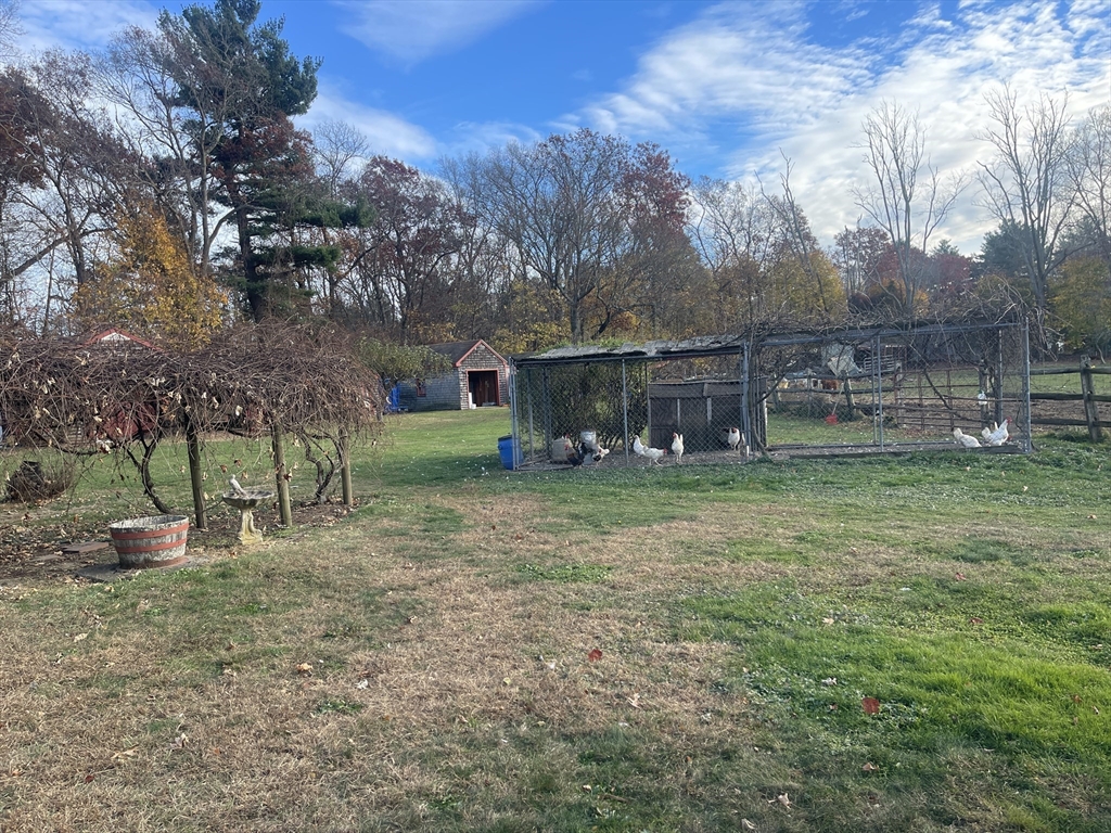 1789 Broadway Raynham, MA 02767 - Photo 14 of 17 front view of a house with a yard