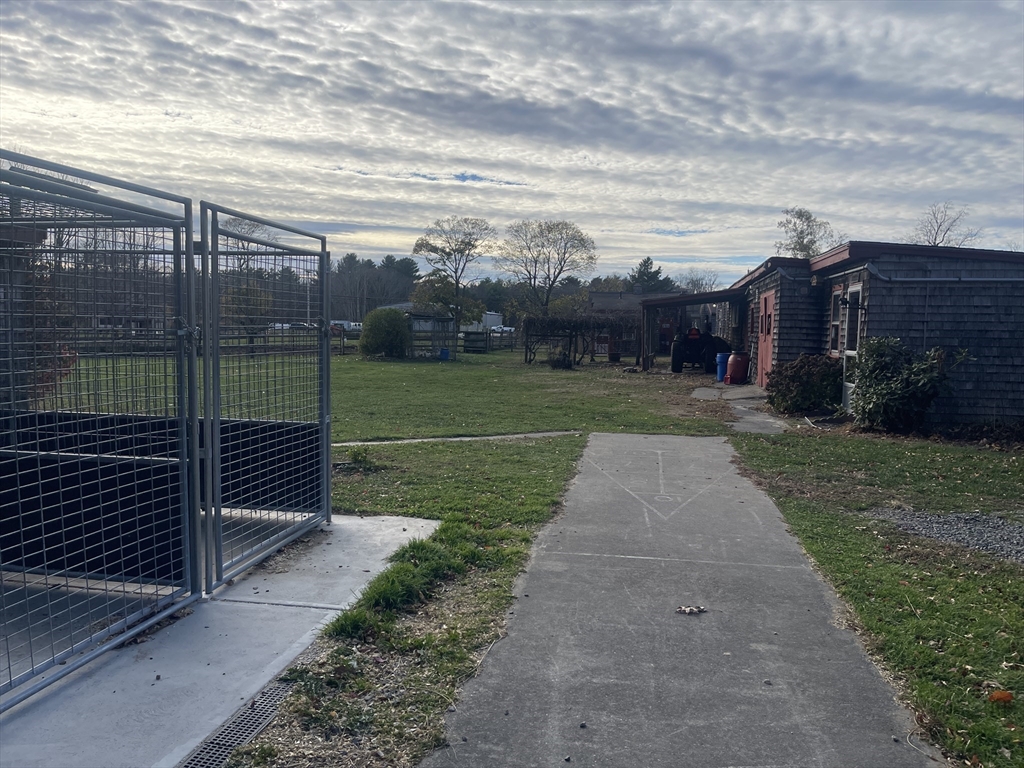 1789 Broadway Raynham, MA 02767 - Photo 8 of 17 a view of a stadium that has a big yard next to a road