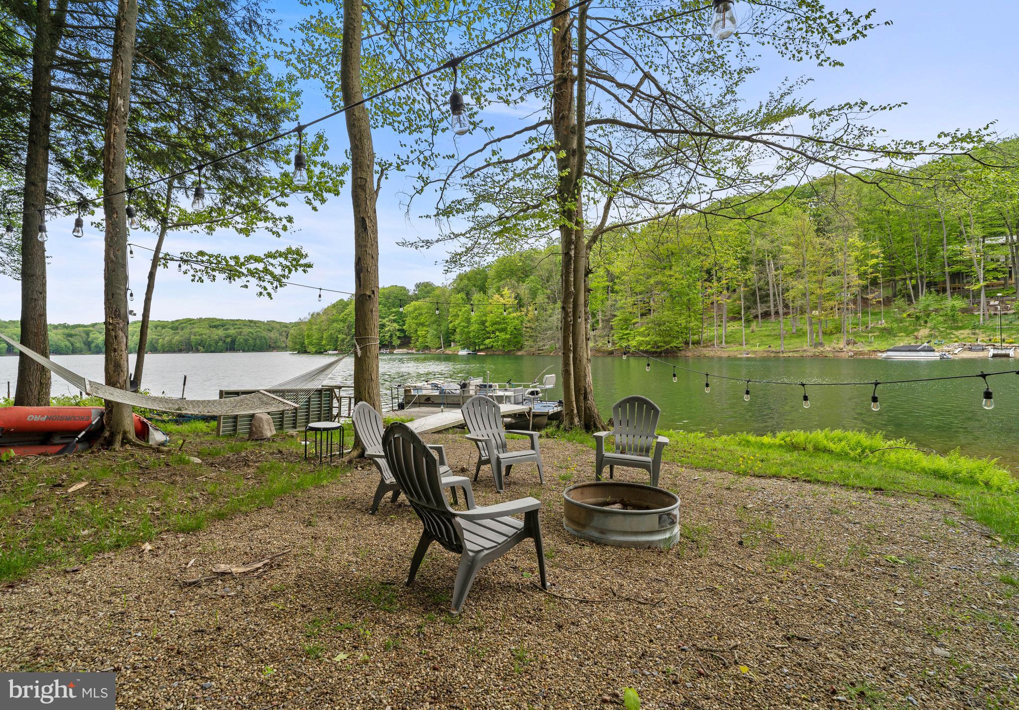 2645 Carribean Road Du Bois, PA 15801 - Photo 48 of 55 a view of a lake with a table and chairs