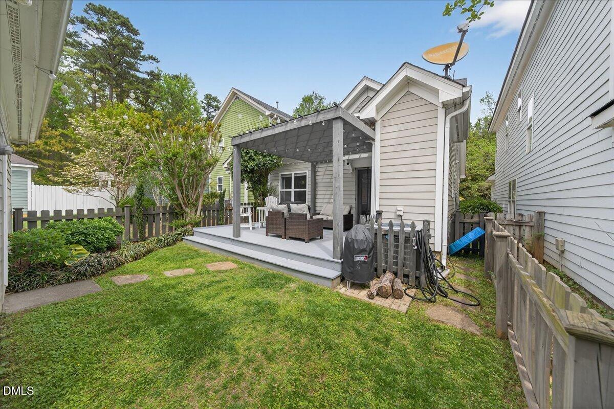 2116 Dunn Road Raleigh, NC 27614 - Photo 19 of 22 a view of a house with backyard and sitting area