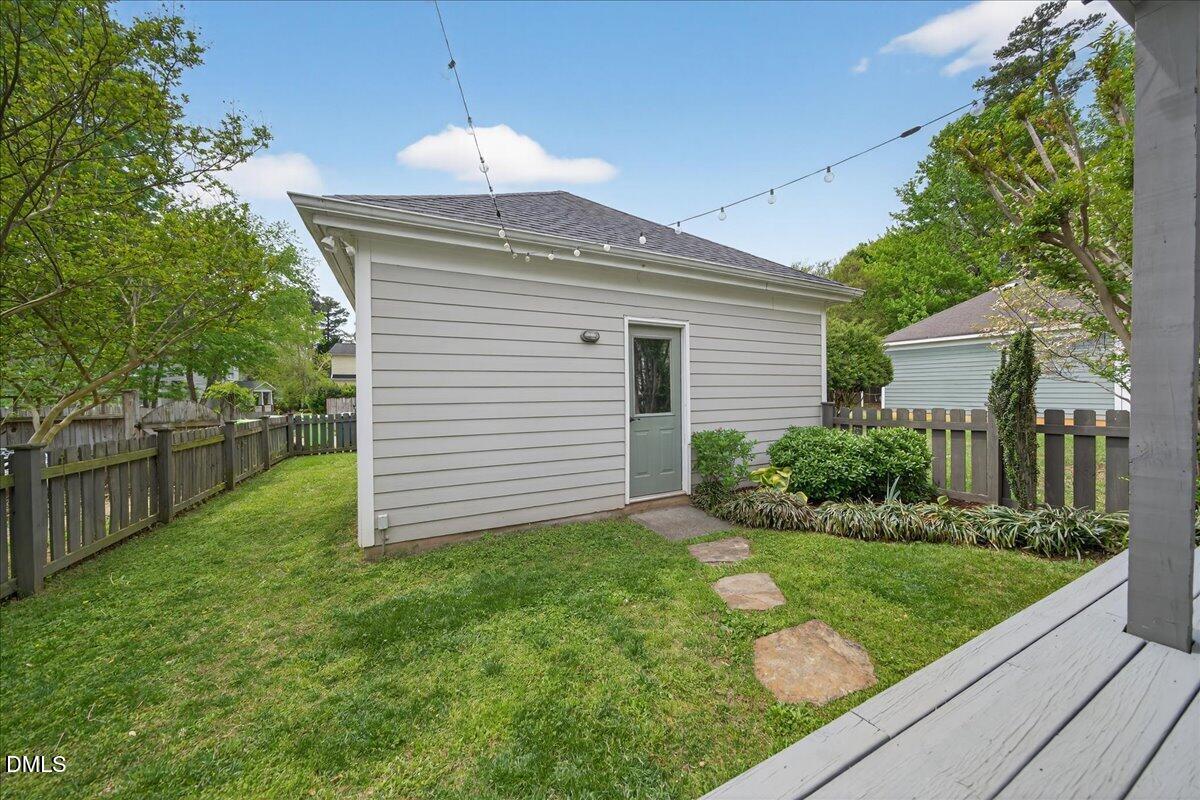 2116 Dunn Road Raleigh, NC 27614 - Photo 20 of 22 a front view of a house with garden