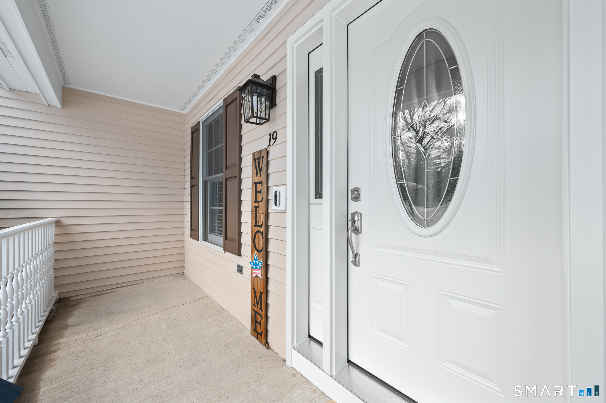 19 Woodside Way Bristol, CT 06010 - Photo 4 of 43 Recently updated new front door with nice sitting porch sets a welcoming tone