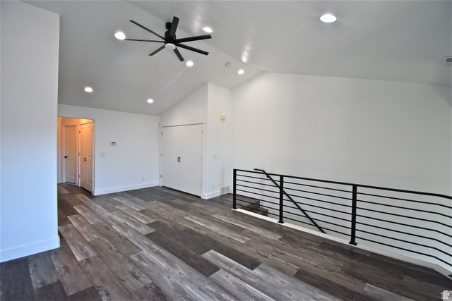 2480 West 450 South, Unit 2 Springville, UT 84663 - Photo 4 of 19 Unfurnished room featuring ceiling fan, dark wood-style flooring, vaulted ceiling, and recessed lighting
