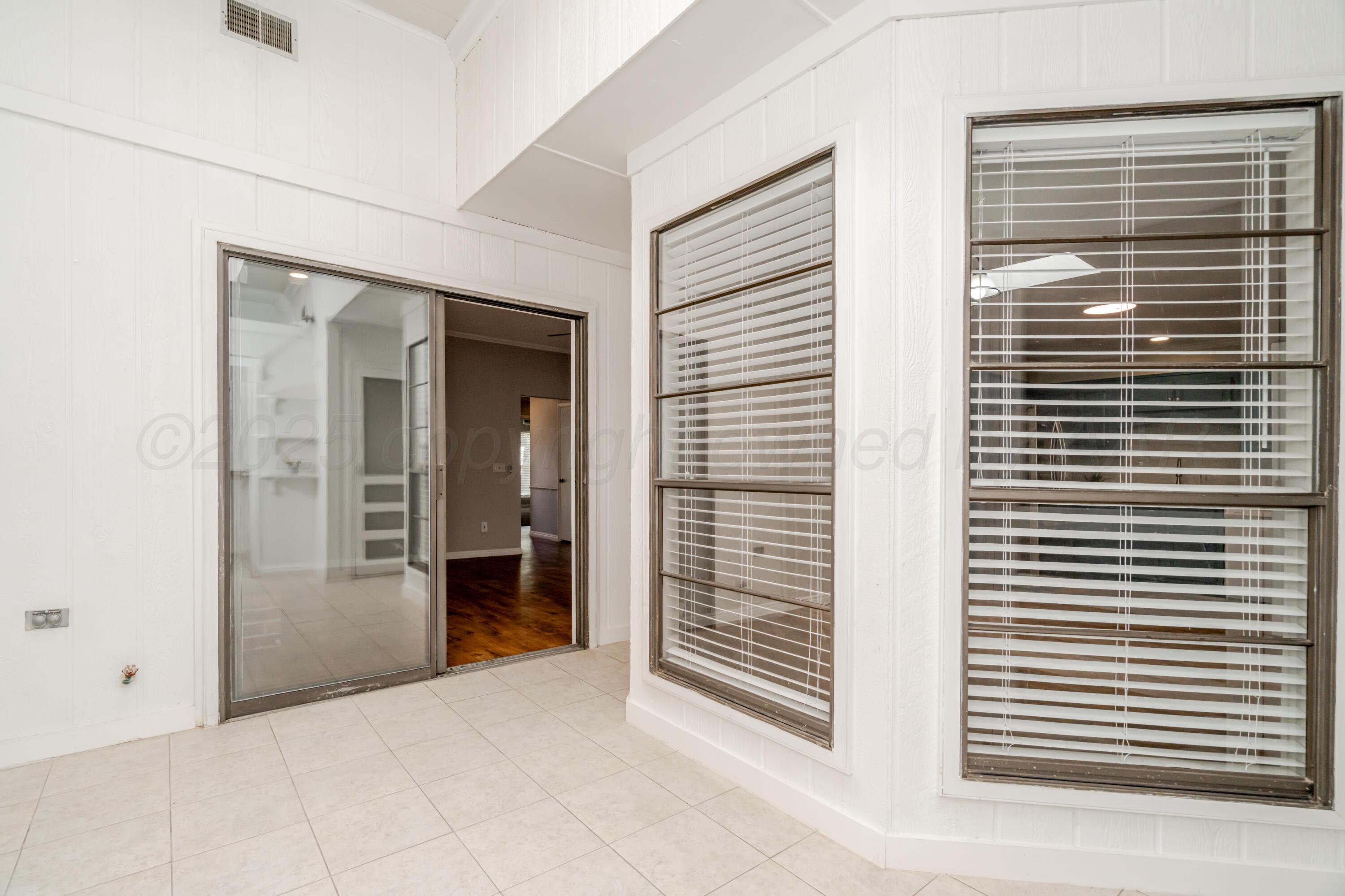 6106 Belpree Road Amarillo, TX 79106 - Photo 11 of 33 a view of an empty room with a window