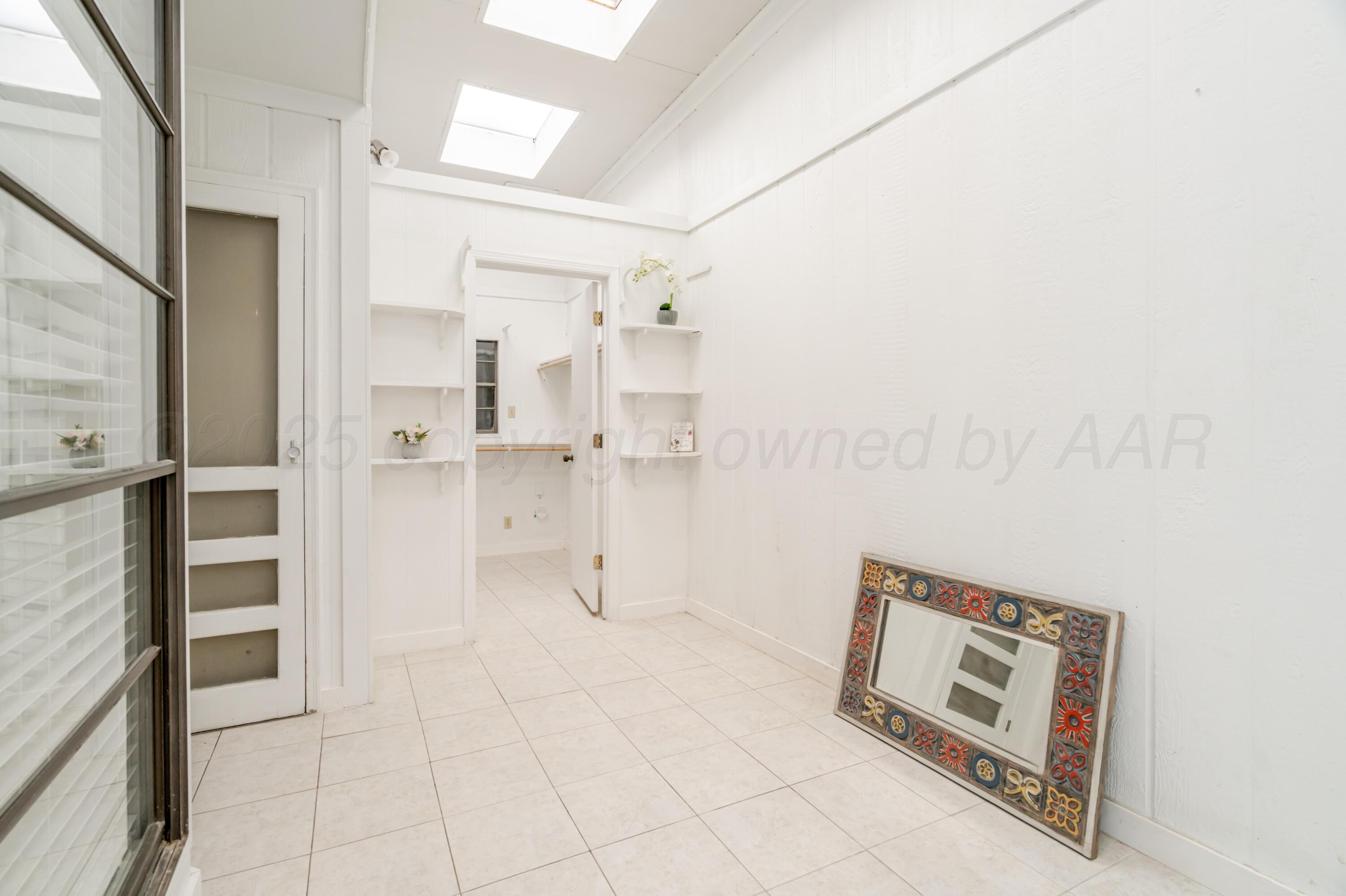 6106 Belpree Road Amarillo, TX 79106 - Photo 13 of 33 a view of a walk in closet