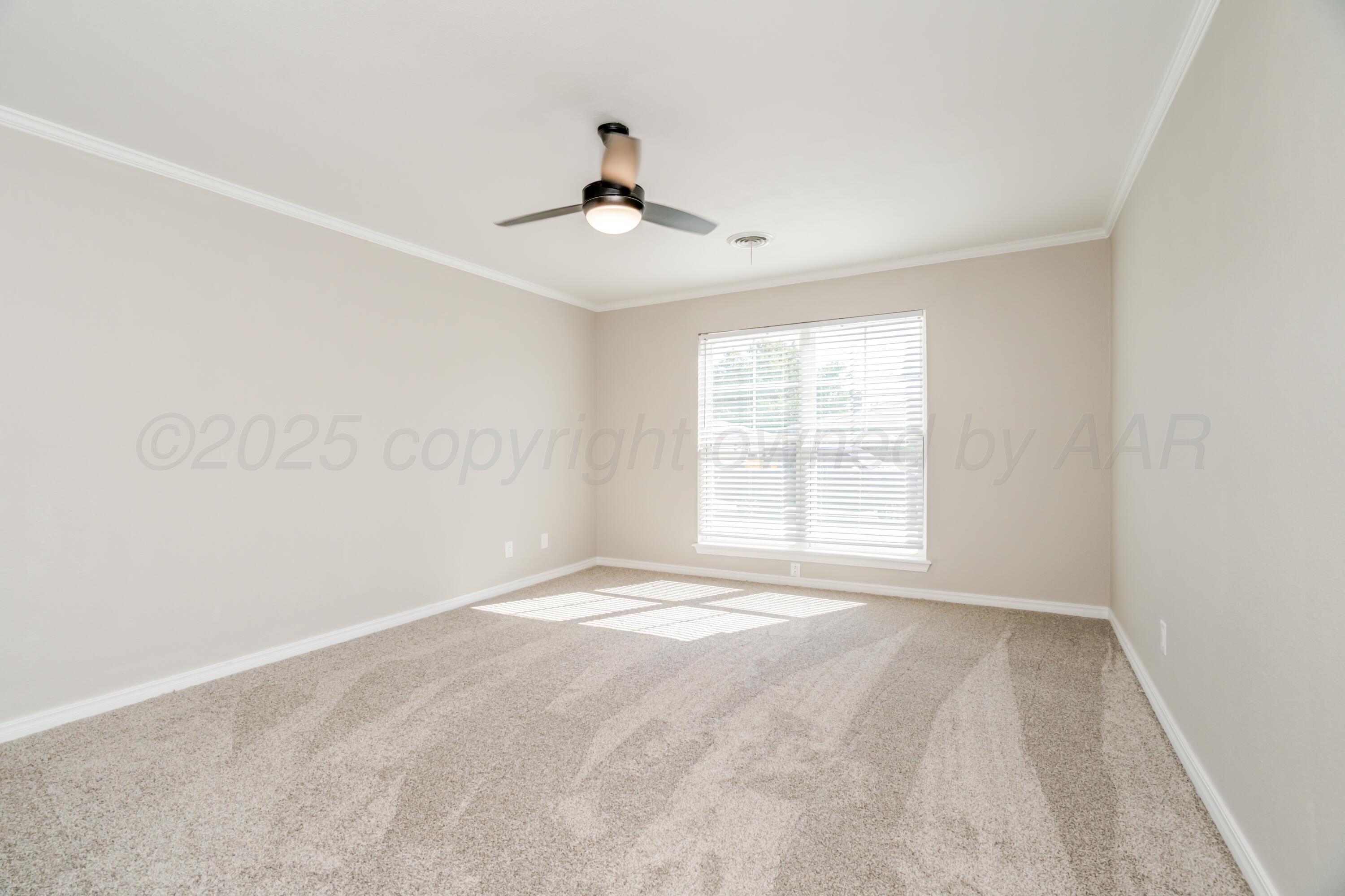 6106 Belpree Road Amarillo, TX 79106 - Photo 23 of 33 a view of an empty room with a window