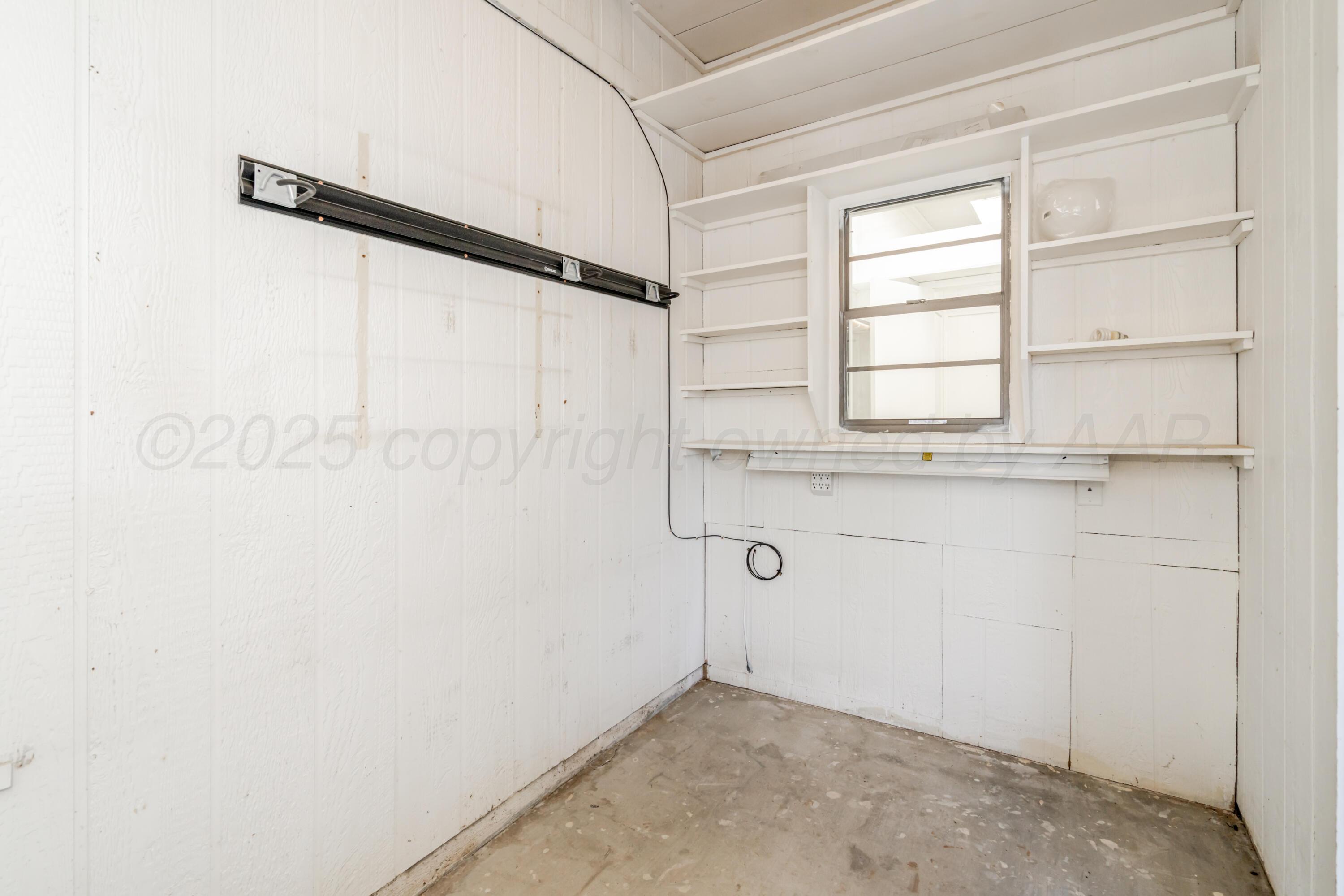 6106 Belpree Road Amarillo, TX 79106 - Photo 32 of 33 a view of a walk in closet