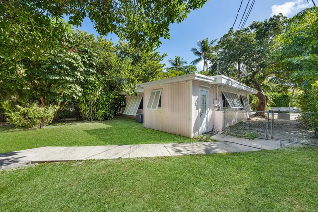 a view of a back yard of the house