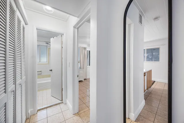 a view of a bathroom from the hallway