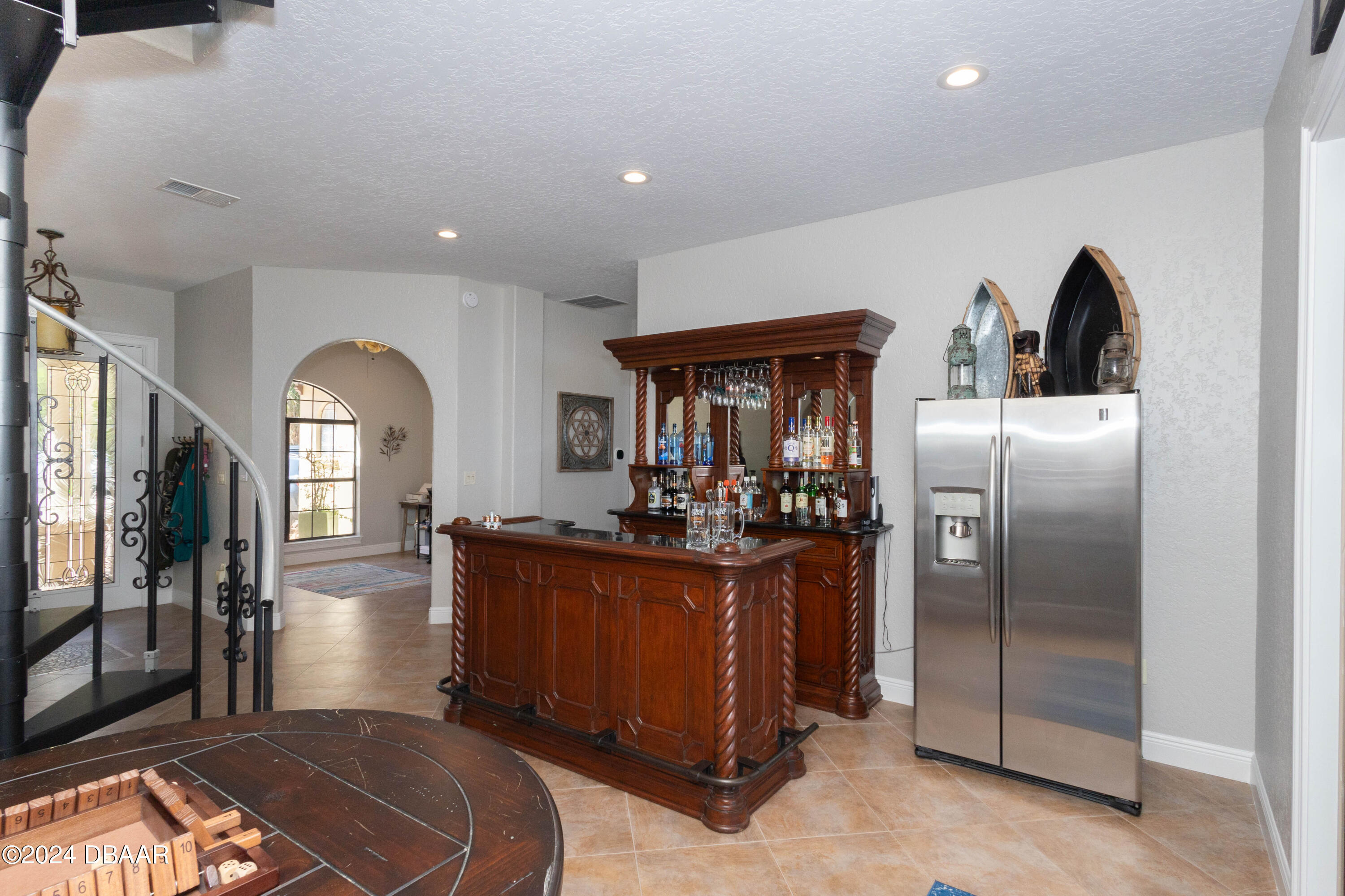175 Whitcomb Drive Geneva, FL 32732 - Photo 20 of 91 a kitchen with stainless steel appliances granite countertop a refrigerator a stove and a sink with wooden floor