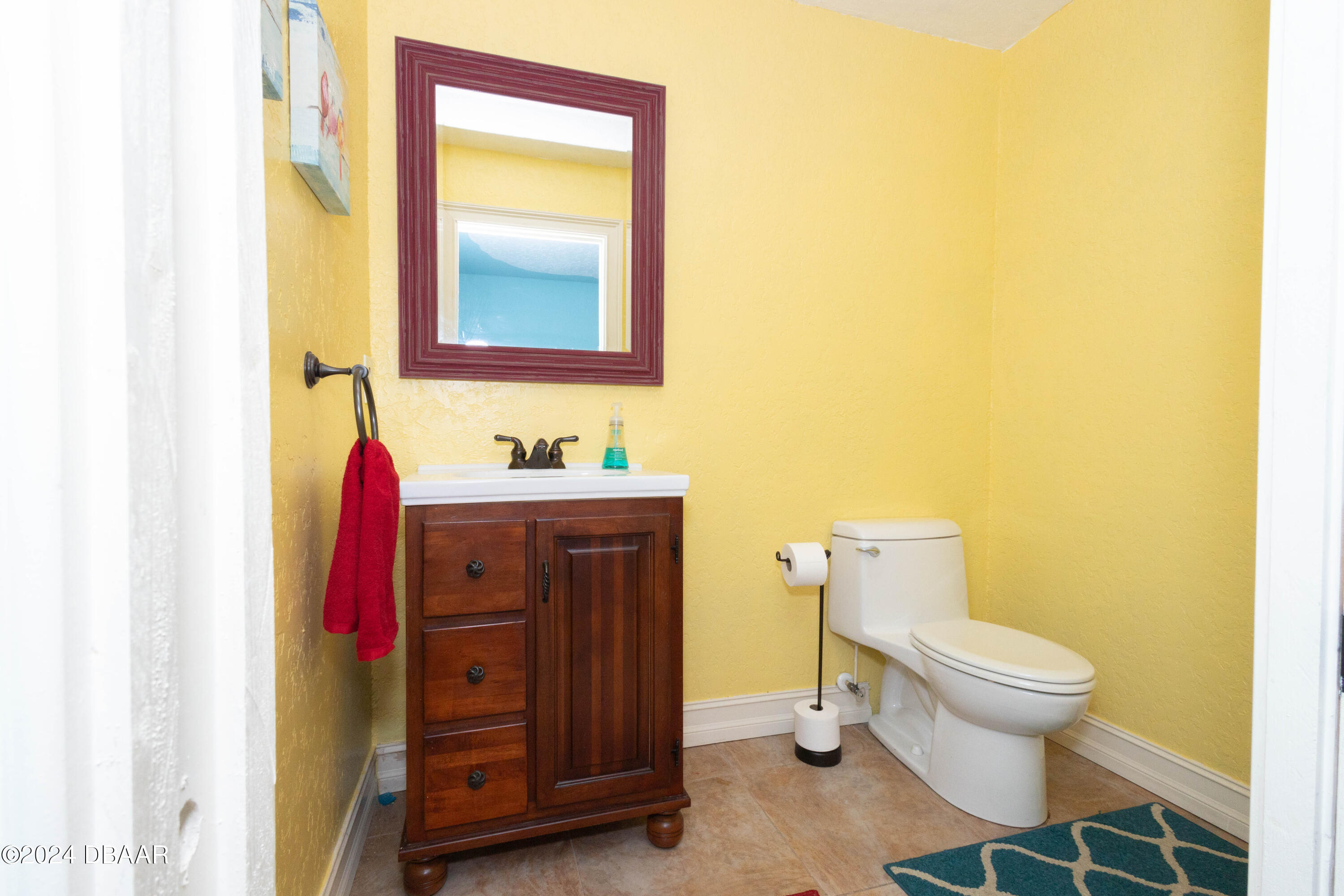 175 Whitcomb Drive Geneva, FL 32732 - Photo 26 of 91 a bathroom with a toilet and a sink