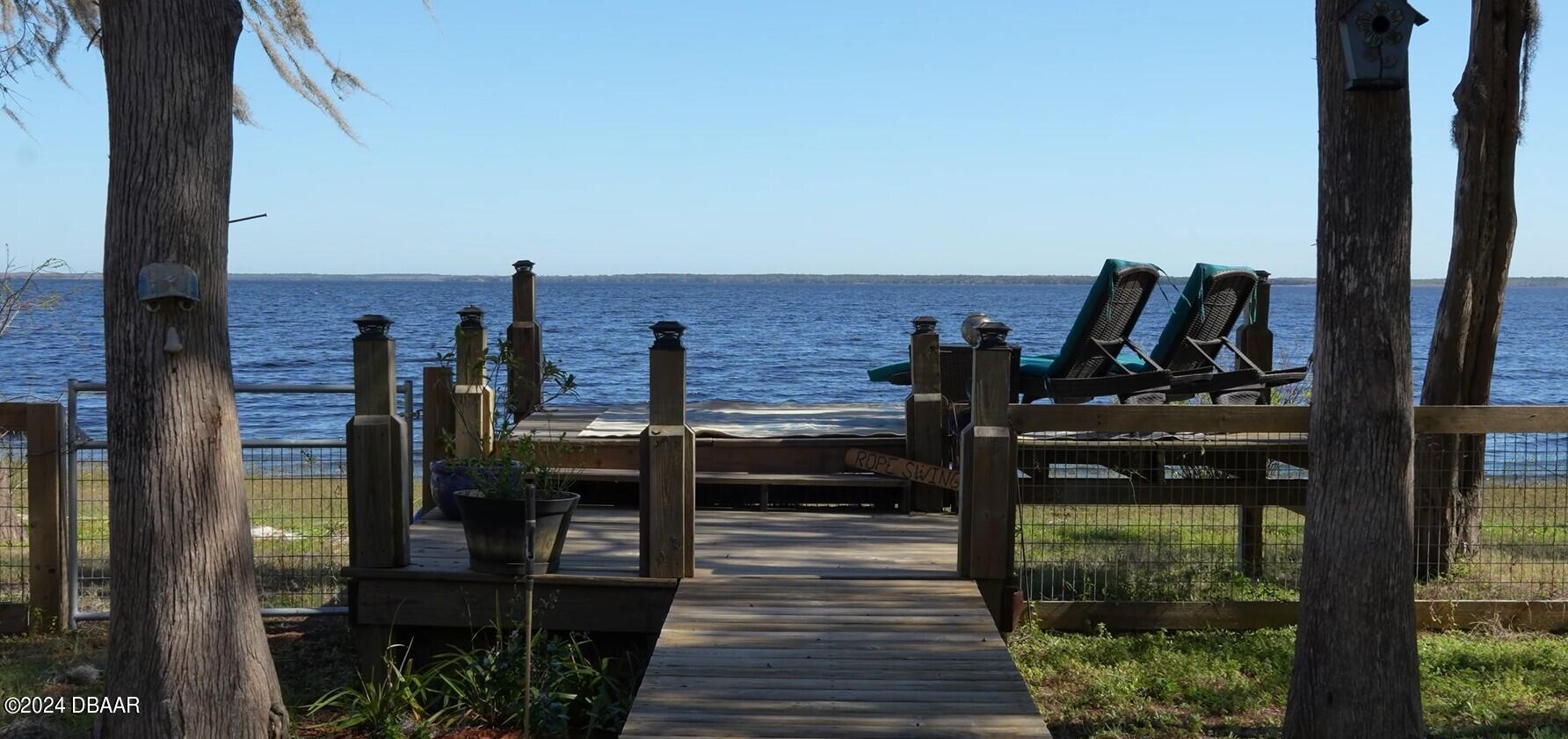 175 Whitcomb Drive Geneva, FL 32732 - Photo 3 of 91 a view of a balcony with chairs