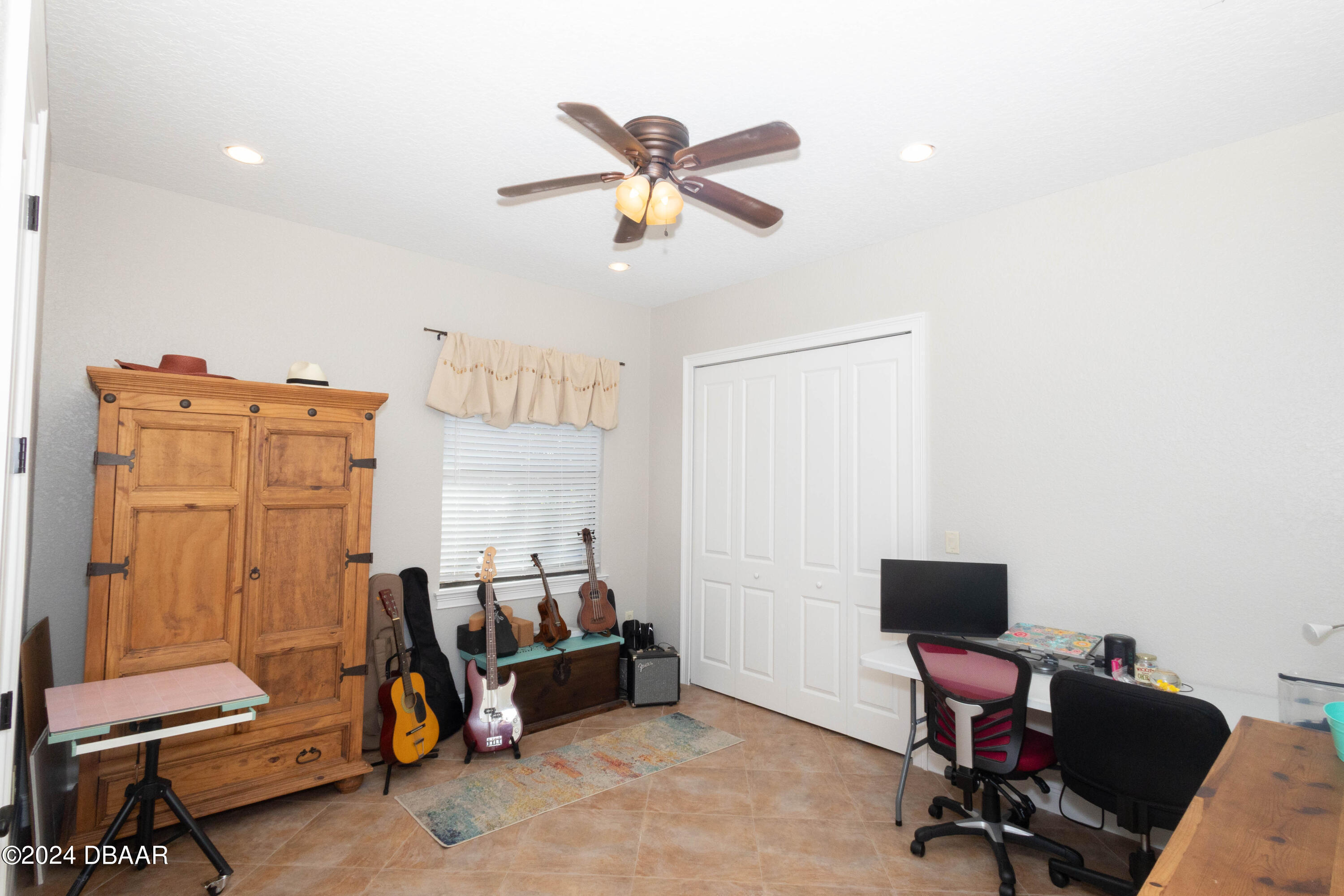 175 Whitcomb Drive Geneva, FL 32732 - Photo 36 of 91 a view of a workspace with furniture and a window