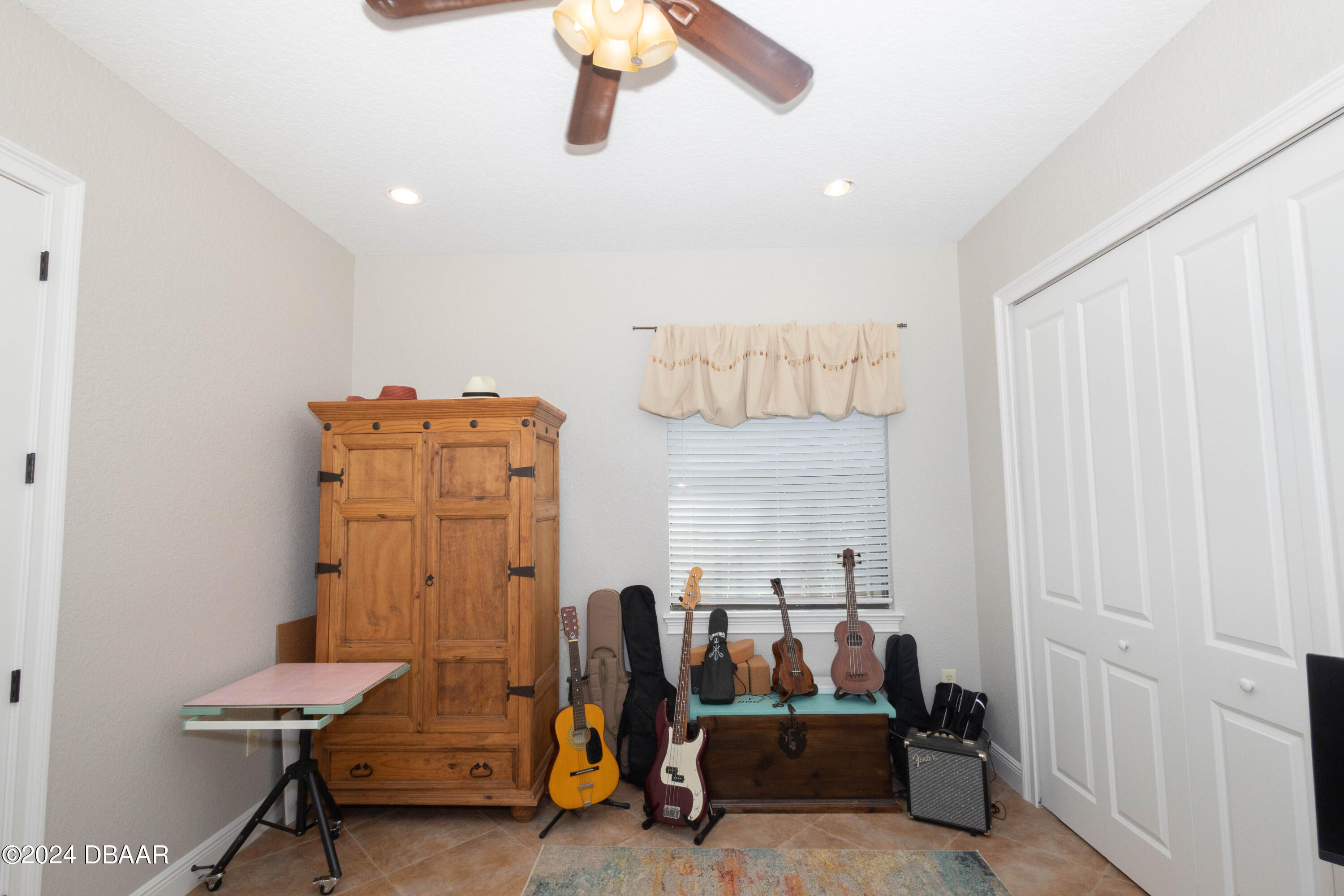 175 Whitcomb Drive Geneva, FL 32732 - Photo 38 of 91 a room with furniture and air hockey table