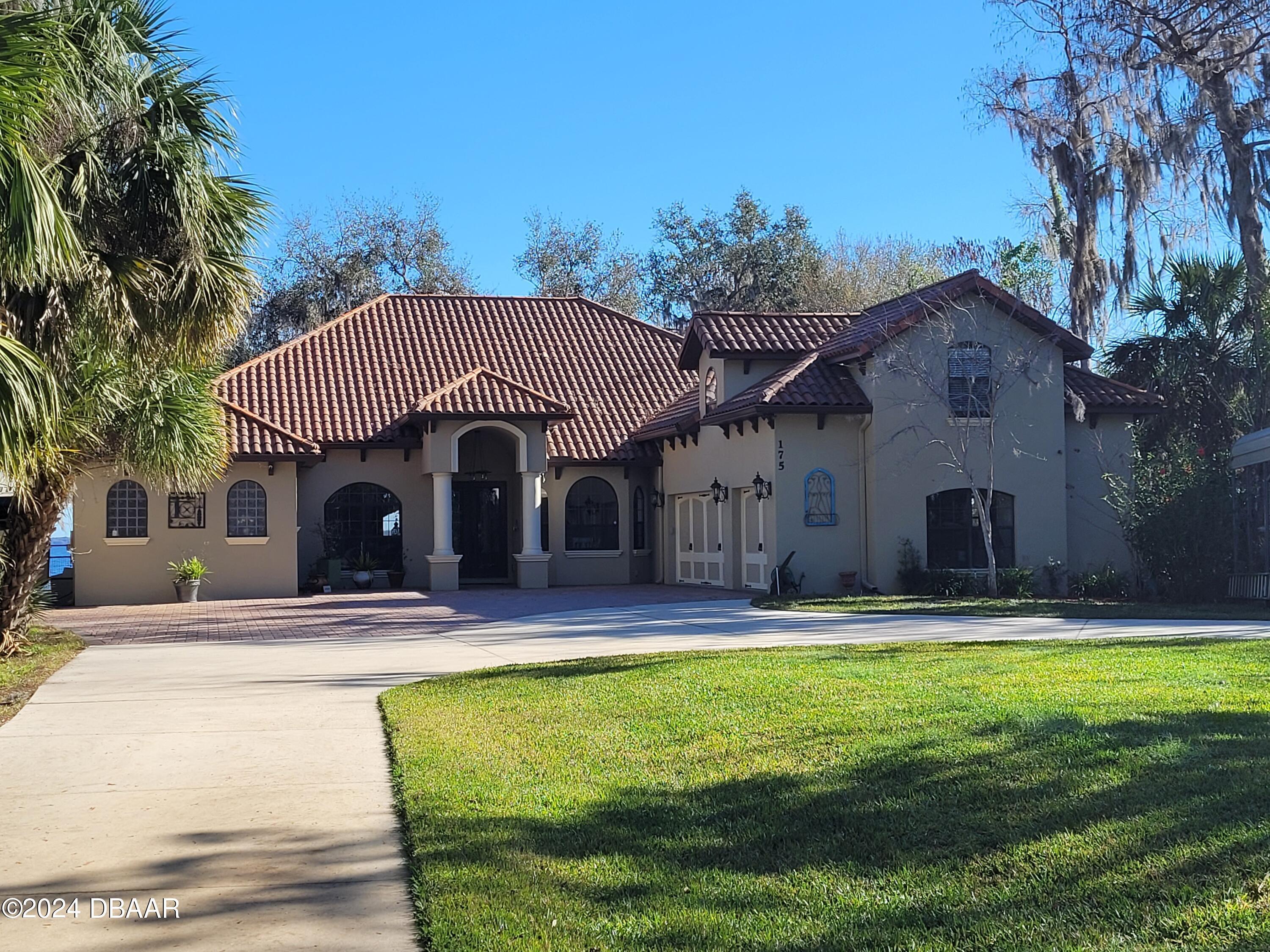 175 Whitcomb Drive Geneva, FL 32732 - Photo 4 of 91 a front view of a house with a yard