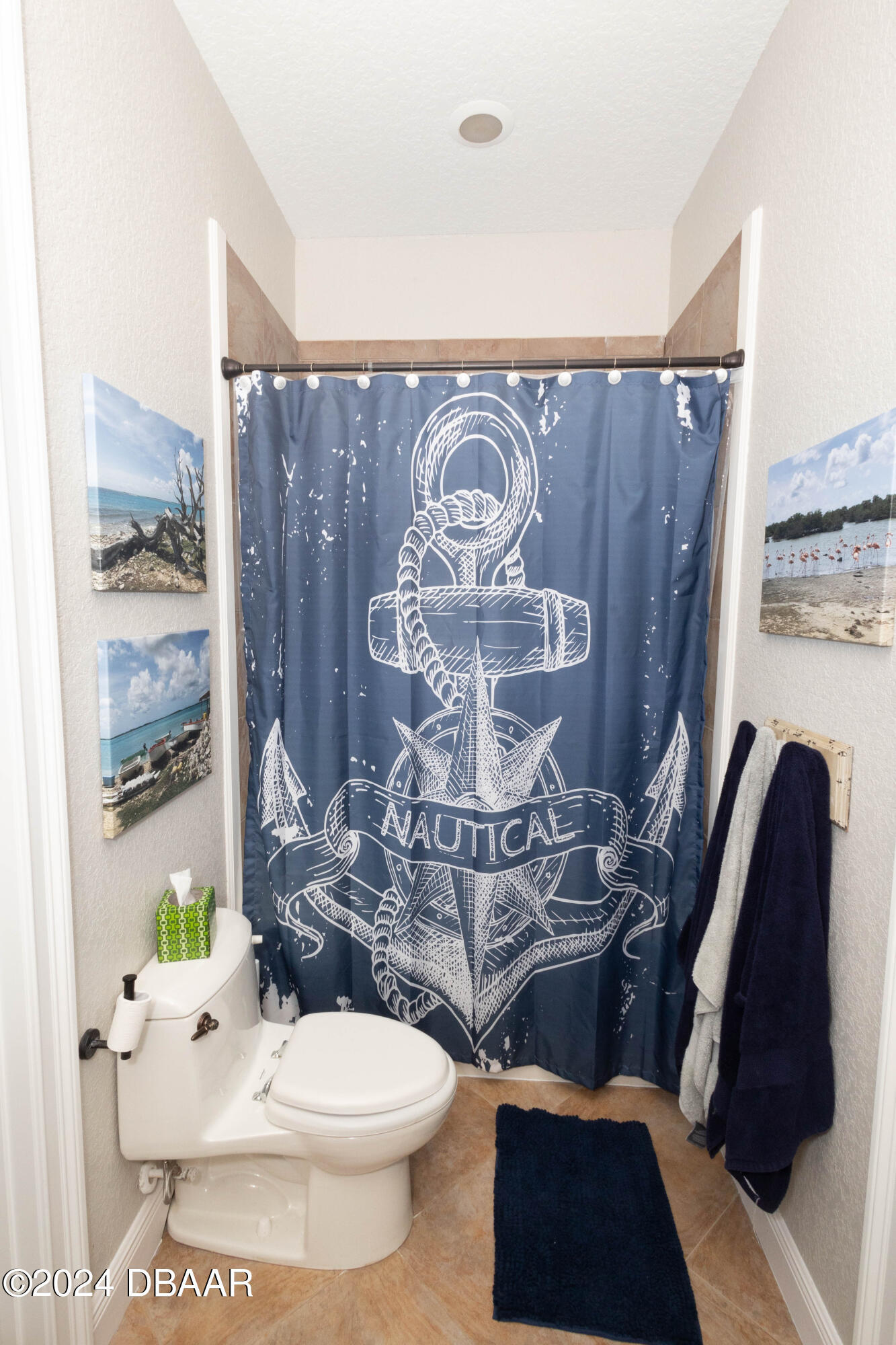 175 Whitcomb Drive Geneva, FL 32732 - Photo 41 of 91 a bathroom with a toilet sink and mirror