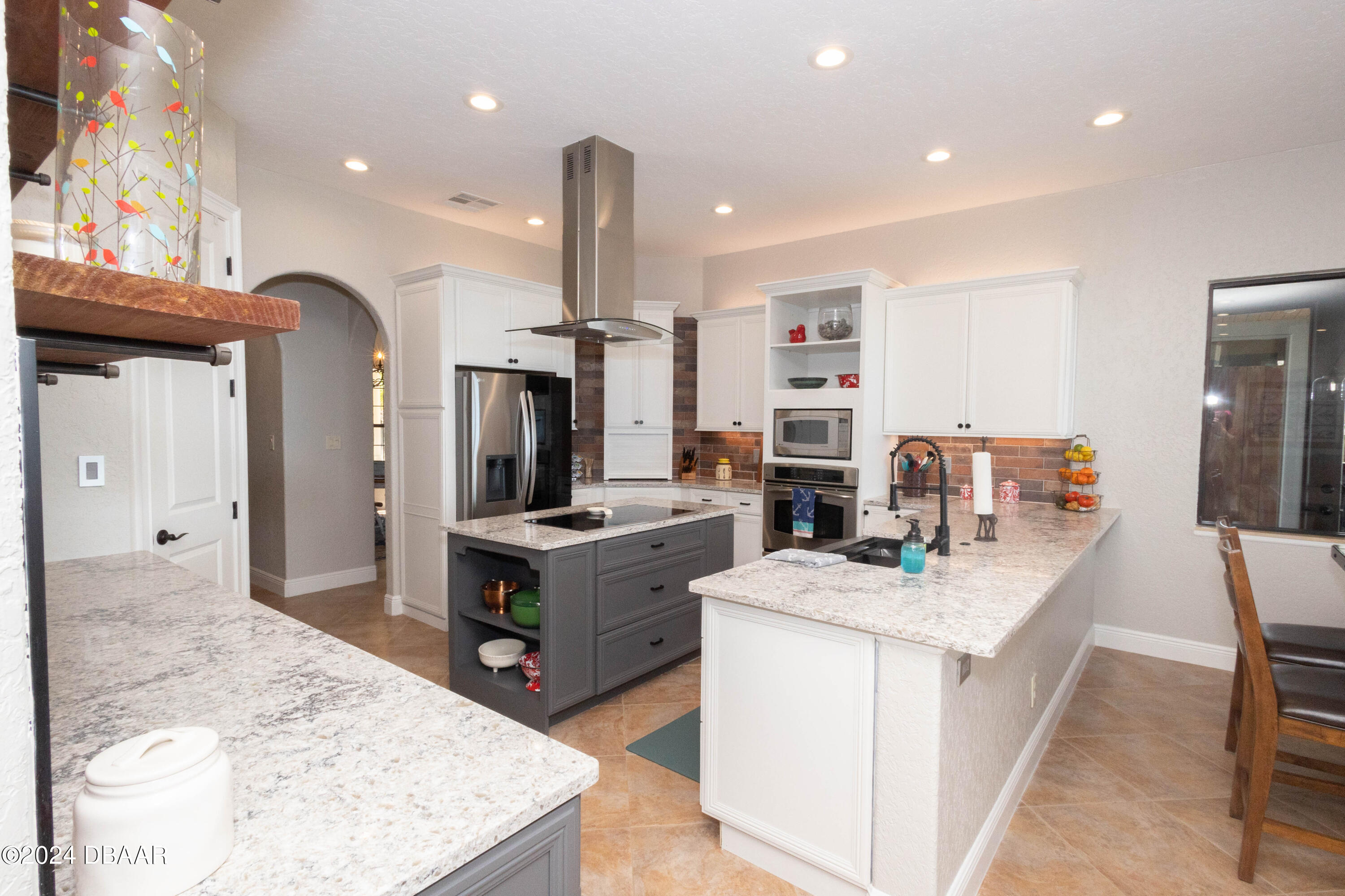 175 Whitcomb Drive Geneva, FL 32732 - Photo 54 of 91 a kitchen with a sink stove and refrigerator