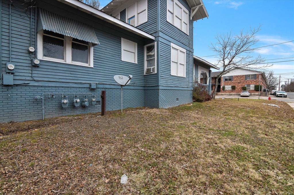 738 1st Street Southwest Paris, TX 75460 - Photo 18 of 25 a view of a house with a yard