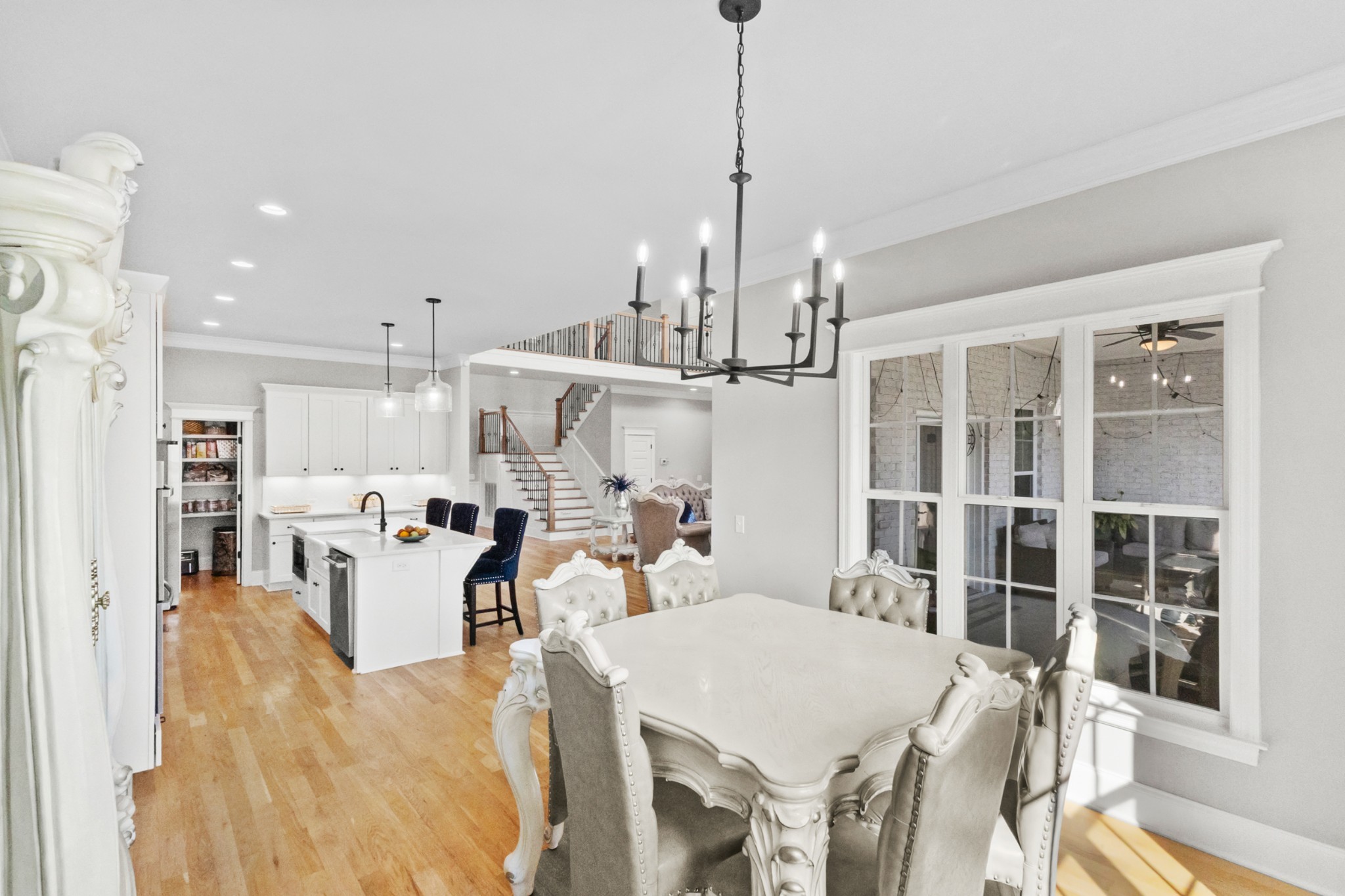 9017 Safehaven Place Spring Hill, TN 37174 - Photo 19 of 50 a large kitchen with kitchen island a large island in it