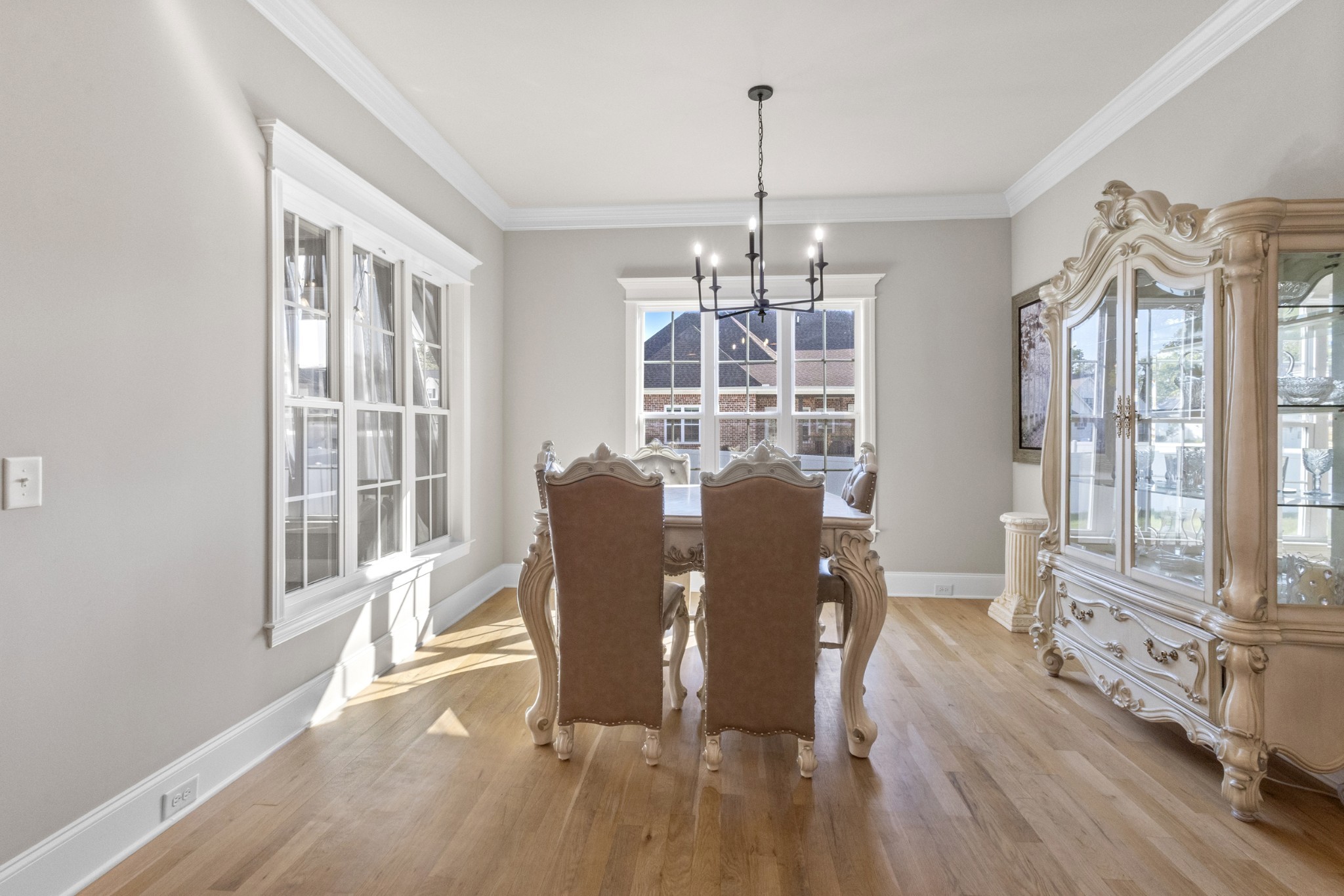 9017 Safehaven Place Spring Hill, TN 37174 - Photo 20 of 50 a view of a dining room with furniture window and wooden floor
