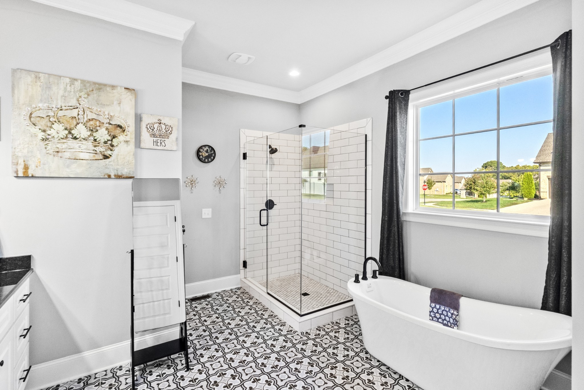 9017 Safehaven Place Spring Hill, TN 37174 - Photo 26 of 50 a bathroom with a shower a toilet and a window