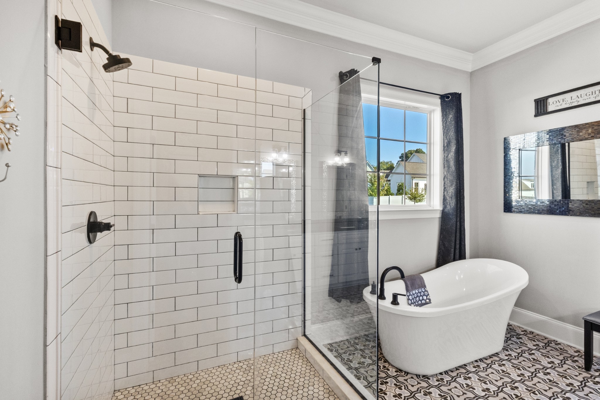 9017 Safehaven Place Spring Hill, TN 37174 - Photo 27 of 50 a bathroom with a bathtub and shower