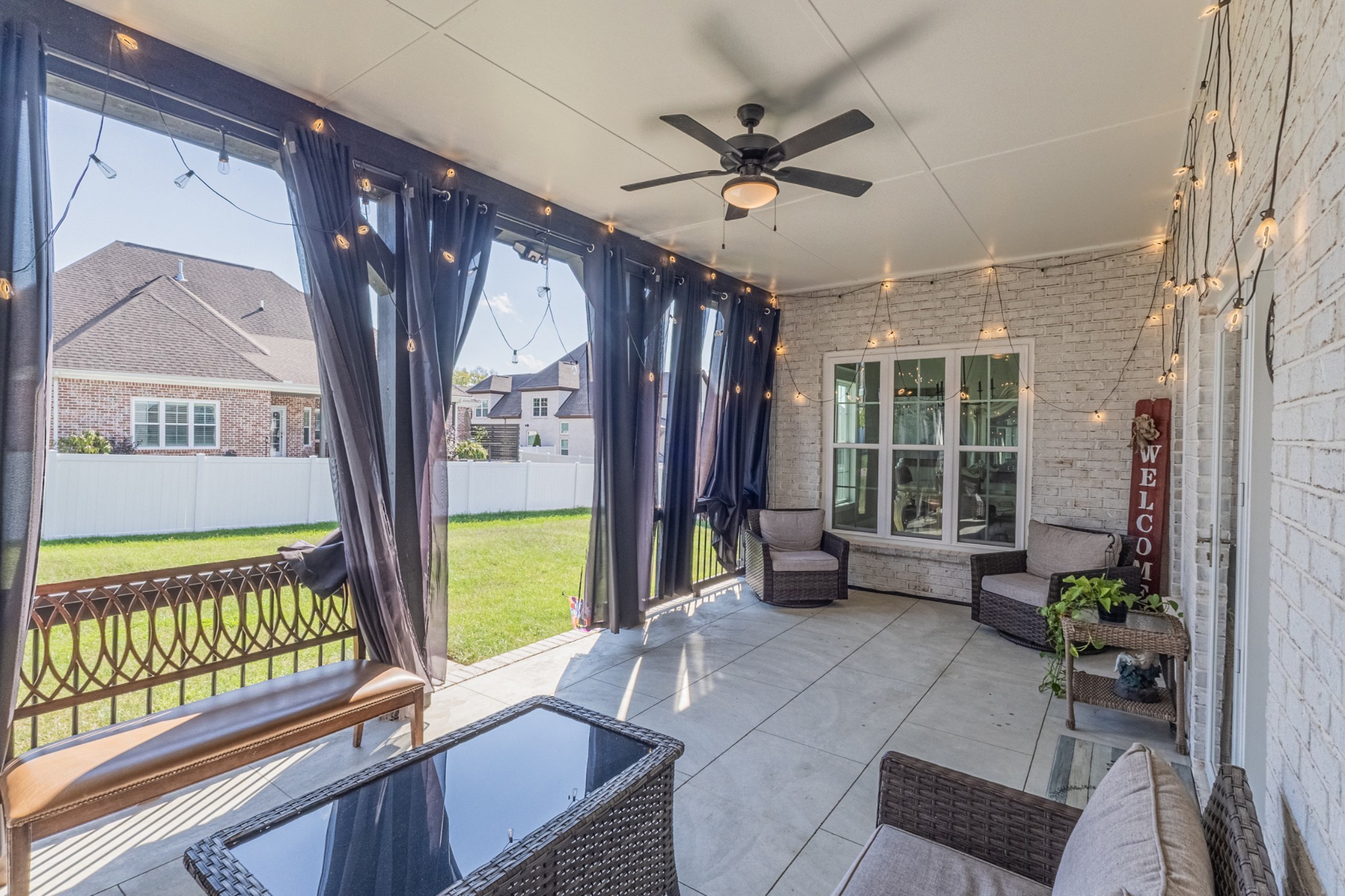 9017 Safehaven Place Spring Hill, TN 37174 - Photo 46 of 50 a living room with furniture and a large window with wooden floor