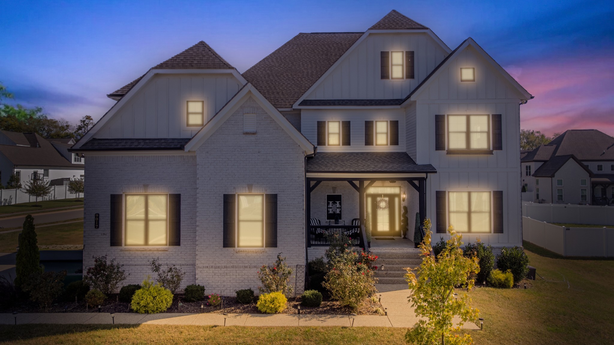 9017 Safehaven Place Spring Hill, TN 37174 - Photo 48 of 50 a front view of a house with garden